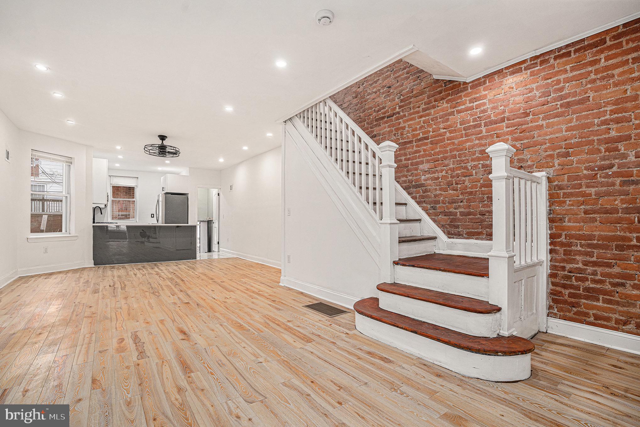 Welcome to 5126 N Sydenham, a newly renovated 3 bedroom 2 full bathroom home. It boasts an open-concept first floor with 520 square feet finished basement, a detached garage, exposed brick wall and new oak hardwood floors in all living spaces. It has all new electric with hard wire smoke detectors and new plumbing throughout including underground plumbing. It is equipped with new 90 percent gas furnace with central air. The kitchen comes complete with stainless steel appliances and quartz countertops. Highlighting the area has access to transportation via Broad Street Line and off-street parking.