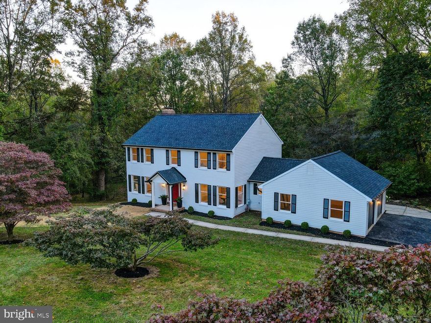 Fully reimagined and redesigned 4 bedroom 4 bath home offering nearly 4200 sqft of finished living space nestled in ONE of Monkton's most sought after neighborhoods, Beckley Estates. Enormous backyard features 3+ acres ready for your imagination.  The home is fully updated including roof, all appliances,  dual zoned HVAC system, flooring and paint throughout, this incredible home is neat as a pin. Meticulously designed top to bottom, featuring a finished basement complete with a home theater room, gym, wet bar and full bath.   The walkout lower level is highlighted with a sliding glass door, large outdoor covered patio making it an entertainer's dream.  Gracious eat-in gourmet kitchen with a large island ready for your inner chef to take charge. Separate formal dining room perfect for holiday entertaining. A wood burning fireplace brings coziness and warmth on those chilly nights in your family room, while a main level home office makes working from home easy and accessible. Need a drop zone for backpacks or personal gear? Wait until you see this ONE right off the 2 car garage! Adjacent to the main level laundry, this home was designed with the mindset to ease your hectic lifestyle. Walk in, drop your worries and step into your Monkton oasis where fun, relaxation and joy emanate from every corner. Three season screened-in porch is just another one of those special spaces offered here on Justin Rd.  This is THE ONE in the 21111 that you must see, welcome home!