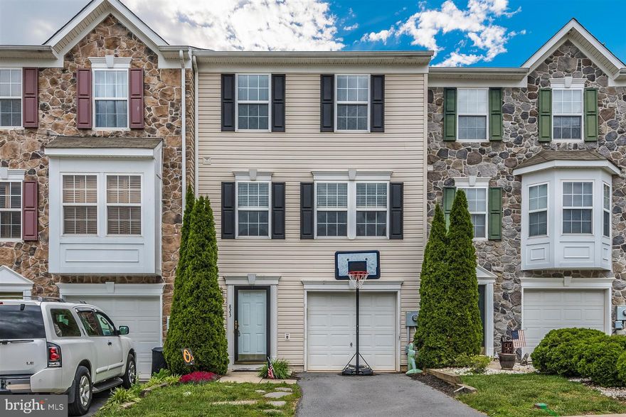 Move in ready 10 year young garage townhome walking distance to Pangborn park!  3 bedrooms, 2.5 baths.  Trex deck off modern open kitchen.  Open ceramic tile lower walk out level to fenced rear yard. Large mater suite w/ separate soaking tub and shower, double vanity.  Fantastic property  Minutes to 40, 70, and major commuting routes!