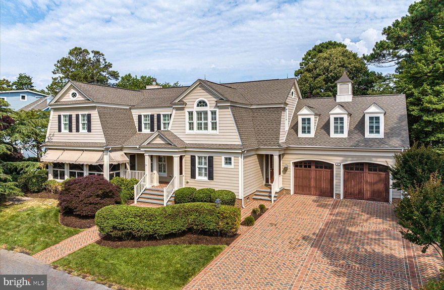 Experience the epitome of coastal living in this stately custom home located on a sought after street in the Pines neighborhood of Rehoboth Beach. Situated just one block from the beach on a rare 100’ x 100’ parcel (double lot), this meticulously landscaped and beautifully maintained home offers an exceptional blend of space, privacy, and location. This short block of Pennsylvania Avenue is the perfect balance of low traffic and excellent proximity to the beach, boardwalk, and Rehoboth Avenue. The sophisticated +/- 4,283 heated SF (5,715 total SF), home features 5 spacious bedrooms, 4 full baths, and one half bath, providing ample room for family and guests. Multiple living spaces ensure comfort and versatility, including the cozy screened porch. The expansive gourmet kitchen is situated adjacent to a formal dining room and both open to an expansive brick paver patio and private rear yard. An excellent feature and elegant setting for entertaining. In addition, this home boasts a rare 2-car garage, with a bonus room above, ideal for a home office, fitness room, rec/playroom, etc., catering to all of your lifestyle needs. Make this exceptional property your own and enjoy the ultimate coastal retreat!