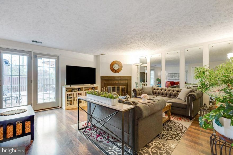 Charming 2 bedroom, 1.5 bathroom townhouse in quiet Pohick Village neighborhood with excellent location!  Delightful home is move in ready and has lovely fully fenced backyard with spacious deck - great for entertaining!  Main level has cozy wood burning fireplace in living room, nice sized kitchen, half bathroom and access to backyard and shed.  Upper level hosts 2 master bedrooms and full bathroom. Hidden storage area over upper level bathroom.  Updates include A/C unit new in 2018, granite countertops and sink installed in 2021, and new tub installed 2019.   Water heater estimated 2015.  Beautiful custom blinds by Next Day Blinds in living room and kitchen have a lifetime warranty.  Full sized washer and dryer in unit on main level.  2 assigned parking spots just outside the home (number 1034) and plenty of guest parking.  
Minutes to 95, 495, 395, Ft Belvoir, Commuter lots, VRE, Lorton Station, and regional parks.  Close proximity to Costco, Wegmans and a variety of shopping and restaurants! 
FEEDS TO:  Lorton Station Elementary, Hayfield Secondary, Hayfield. HOA FEATURES:  Snow Removal, Trash.  Rent back needed.  Make your appointment today!