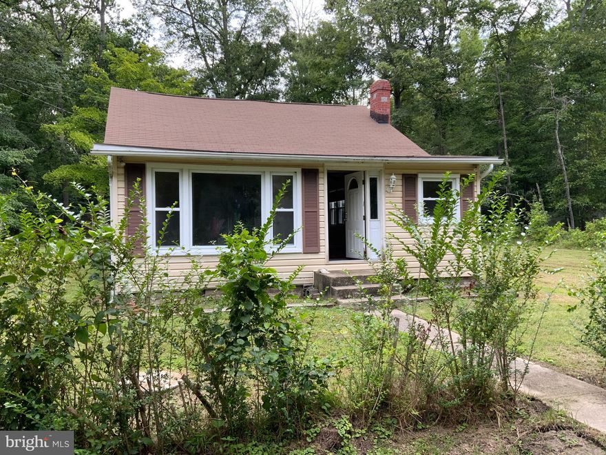 INVESTORS!!! This AS IS REHAB property is surrounded by beautiful LARGE homes in North Beach Park just over the Calvert County / Anne Arundel County line. There are TWO TAX RECORDS that are included in  the sale. The REHAB home @7066 Myrtle is on LOT1 and the other 3 lots (Lot2, 15, and 16,) are @ 7064 Myrtle.  Both TAX RECORDS are included. This entails one deed. CASH or REHAB loan is NEEDED.  NO APPLIANCES included. NO Flooring. Shallow Well. Well Pump is REMOVED. No Electric Meter at site. AS IS SHED in rear. AS IS Fireplace Insert.  Incomplete road on left. BEAUTIFUL  location and property.