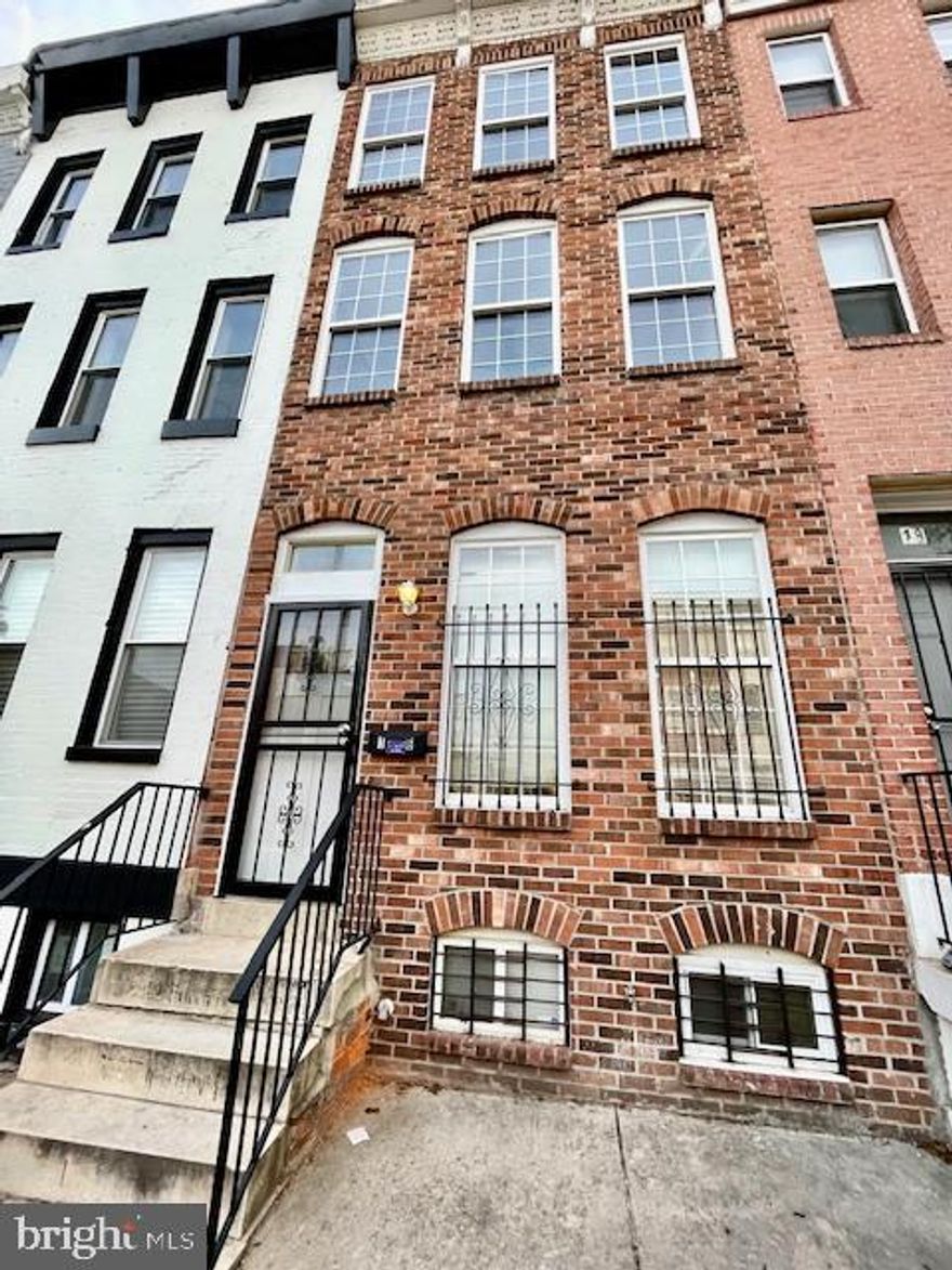 Welcome to this fully renovated four-story home featuring 4 bedrooms, 3.5 bathrooms, and an office that can also serve as a bedroom. If you’re looking for charm close to the city, this is it. The primary bedroom boasts a spacious walk-in closet and a stunning view of the Baltimore skyline. Enjoy evenings and gatherings with family and friends on the top-floor deck. The completely fenced backyard offers additional privacy and outdoor space. The finished basement includes an office, full bathroom, and family room. Located in the heart of Hollins, you’re close to restaurants, cafés, shops, and all the amenities downtown Baltimore has to offer—just 8 minutes from the University of Maryland and M&T Bank Stadium. Seller will pay 100% closing cost!!
