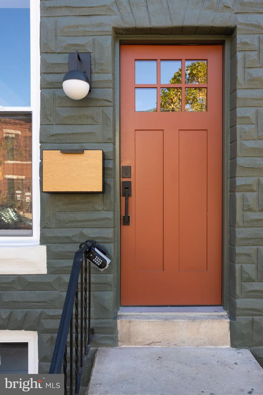 Welcome to 509 W. 27th Street, a fully reimagined, top-to-bottom renovation in the heart of Remington, one of Baltimore’s most vibrant and top-rated neighborhoods.
From the curb, this home immediately draws attention with its olive-green façade and terracotta front door, a stylish nod to Remington’s creative spirit. Step inside and you’ll find custom tile in the foyer leading to an open-concept first floor, where engineered white oak hardwoods flow seamlessly throughout.
The living room’s exposed white brick and shiplap accent wall blend modern craftsmanship with classic Baltimore character. The kitchen is the centerpiece of the home, anchored by a stunning island with a quartz waterfall edge and seating for three. Every detail was carefully considered, including white shaker cabinetry, open shelving, stainless steel appliances with a vented hood, and olive-colored exposed brick that ties it all together.
Off the kitchen sits a laundry area with hookups and added storage. Upstairs, refinished hardwood stairs lead to three bedrooms and two full baths. The primary suite offers serene park views, exposed brick, recessed lighting, and a spa-inspired bathroom with a custom tile shower and designer fixtures. The two additional bedrooms, including a rear room with more exposed brick, share a beautifully appointed hall bath with bold tilework and modern finishes.
The fully finished basement features durable LVP flooring and flexible space for a home gym, office, or media room. Other recent updates include a brand-new HVAC system that ensures year-round comfort and efficiency.
Outside, enjoy ample street parking and the convenience of city living. Sisson Street Park is just steps from your front door and is perfect for dog walks, neighborhood events, and morning coffee strolls. Around the corner, discover Remington’s local favorites such as Café Los Sueños, Clavel, W.C. Harlan, R. House, Greedy Reads, Ottobar, 29th Street Tavern, and Papermoon Diner.
With only two traffic lights between you and the 29th Street entrance to I-83, you can be in downtown Baltimore in 10 minutes, in Towson in 20 minutes, and in Hunt Valley in 25 minutes.
This is city living done right, where thoughtful design meets everyday convenience, all within one of Baltimore’s most exciting and award-winning neighborhoods.