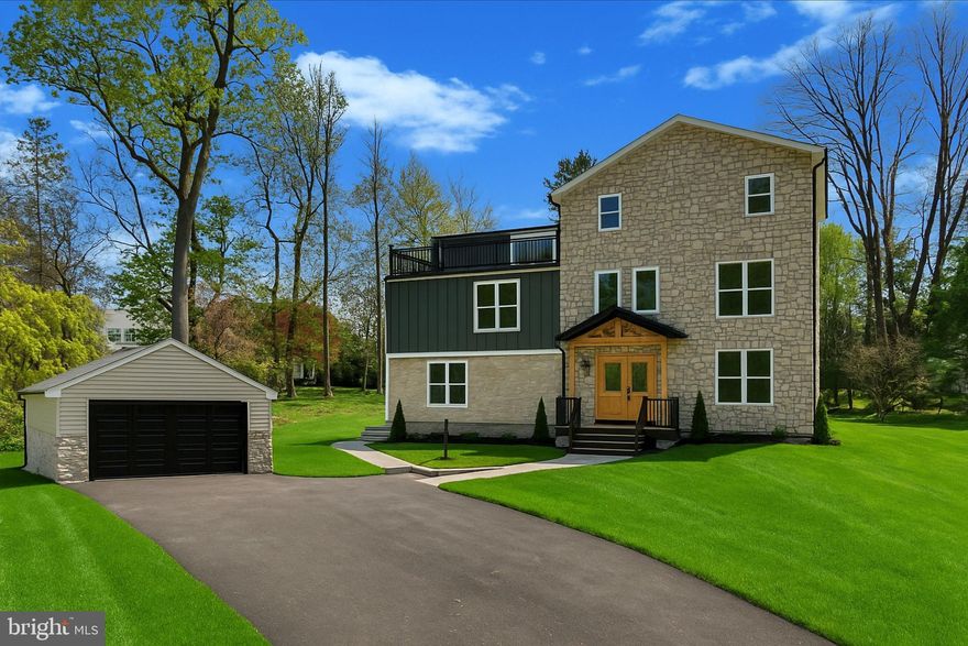 Sitting on nearly an acre, this new construction custom home blends modern luxury with timeless charm in the highly sought-after Lower Merion School District. The seller is offering an $8000 landscaping and landscaping lighting package, as well as a $8000 budget for appliances. Thoughtfully designed with top-tier materials and craftsmanship, this home offers both durability and elegance. Built for lasting quality, the home features Hardie siding and natural stone on the front, with CertainTeed vinyl siding on the sides and back. Viwinco double-hung windows enhance energy efficiency, while the new roof and gutter system includes a seepage bed for proper rainwater management. The home is equipped with a three-zoned forced-air HVAC system. Additional features include a gas tankless water heater for continuous hot water, brand new plumbing, and a brand new 200-amp electrical service. Step onto the welcoming front porch and into the foyer, where you'll immediately notice the stunning craftsmanship and natural light that fills the space. To the right, a formal dining room or flex space offers the perfect setting for memorable dinners or extra living space. Moving past the foyer, the spacious living room provides an inviting atmosphere for relaxation and boasts a gas fireplace. At the rear of the home, the chef’s kitchen features Fabuwood solid wood cabinets with dovetail drawers and soft-close doors, natural quartzite countertops, and a custom range hood. The kitchen also offers a 15 foot long and 9 foot high nano door system that opens all the way up into the back patio. A  butlers pantry, and a powder room with custom tile work complete the main level. Upstairs, the primary bedroom is a true retreat, featuring his-and-hers walk-in closets, a luxurious ensuite bathroom with a dual vanity, soaking tub, and massive shower, and a balcony that overlooks the backyard. A second bedroom includes an ensuite full bathroom as well, while two additional equally spacious bedrooms share a third full hallway bathroom. All bathrooms are finished with custom designer tile, Kohler toilets, and Delta faucets. A walk-in laundry room with hook-ups provides added convenience. The third level boasts a substantial den or secondary living room area. Another bedroom, that could also be used as a home office or den, has its' own ensuite bathroom as well. This level also offers a large walk-out balcony, providing additional outdoor space and stunning views. The home is designed for both beauty and function, featuring two walk-out balconies with black metal railings and composite decking, which require no upkeep. The large backyard is a blank canvas, ready to be transformed into a private outdoor oasis. The basement houses all mechanicals, includes a French drain and two sump pumps, and features an epoxy-coated floor for easy cleaning. Additional highlights include: shaker-style custom doors and trim supplied by Freedom Millwork; LED recessed lighting and designer fixtures throughout; decora switches and outlets, plus under-cabinet lighting in the kitchen; a walk-in butler’s pantry with custom cabinetry, shelving, a prep sink, and butcher block countertops; and Sonos wireless speaker system for indoor and outdoor entertainment. Located in the heart of the Main Line, this home is just minutes from Villanova University, the newly constructed Black Rock Middle School, and the charming towns of Bryn Mawr, Wayne, West Conshohocken, and King of Prussia. With easy access to Route 76, 476, Center City Philadelphia, and the airport, this location offers convenience without compromising on space or privacy. This remarkable home is built for modern living, offering timeless design, premium finishes, and unparalleled comfort!