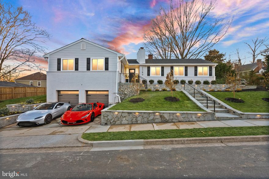 Stunning Custom Rebuilt Home on 1/4 Acre Corner Lot. This beautifully rebuilt custom residence boasts an array of high-end features and modern amenities, nestled on a generous 1/4 acre corner lot. New roof,  siding, windows, gutters, landscaping,  and retainging walls outside. New electric, plumbing, havc, insulation, drywall on the inside. Enjoy vaulted ceilings adorned with charming beams, coffered accents, and custom tile work throughout the home. Cook and entertain in style with a custom waterfall kitchen island featuring quartz countertops that flow up the backsplashes, custom black and walnut kitchen cabinets with $40,000 in professional appliances throughout. This home includes a wine cellar, spacious butler's pantry and a full bar to impress your guests. Unwind in the cozy movie theater, or enjoy outdoor movie nights with an outdoor TV. Modern bidet toilets with remote controls and energy-efficient spray foam insulation enhance comfort and sustainability. 2 electric car plugs in garage. Smart appliances, smart TV's central control center for Cat 6 to each room with Coax. Stay warm by one of the two fireplaces, while you charge your cars in the insulated garage with two electric car plugs. The home also features new electric and plumbing to the street and a brand-new Carrier HVAC system. An all black mudroom with built-in benches and golden coat hooks adds practicality to your daily routine. Located just 2 traffic lights away from DC, this home is conveniently situated close to everything you need. It’s only 5 minutes to Georgetown, offering an array of shopping, dining, and entertainment options. This exquisite property is too much to list! Don’t miss out on the opportunity to call this remarkable house your home. Schedule a showing today!