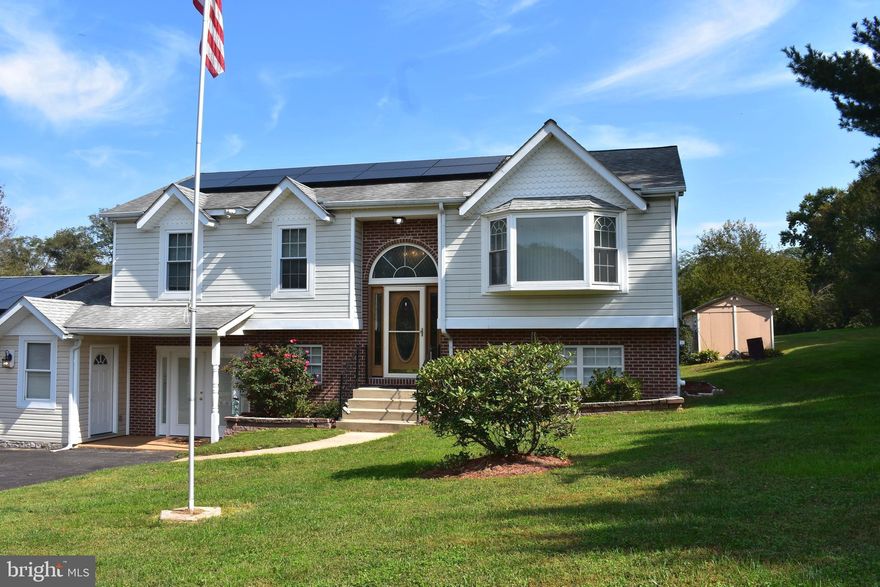 This inviting home sits on a premium corner lot of more than one acre and a half.  The kitchen is usually the center of any home and this one is no exception. New Granite countertops and  plenty of cabinets make it easy to stock up. Positioned off the kitchen is a newer deck for those long anticipated gatherings. The savings from the included leased solar panels help sweeten the deal! You also get ample parking with the over-sized two-car garage and drive way.  Solar Panels to save on your utility bills.  Look no further if you are seeking a spacious single family home that exemplifies country living minutes away from I95 for easy commuting.