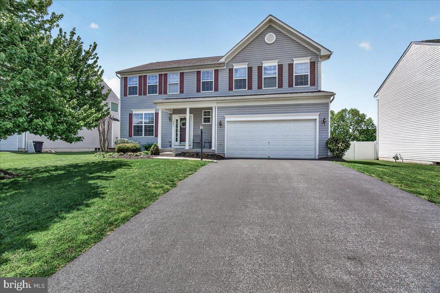Need Space To Grow? Welcome to 205 Solar Dr - your "Forever Home in Walkersville" - a beautifully maintained 4-bedroom, 2.5-bathroom Colonial built in 2009, on nearly a quarter acre lot with over 3200 square feet, this home checks every box for comfort, style and everyday functionality. If you’ve been searching for a property that balances "work-from-home" flexibility with "room-to-play" reality, this is it.
The layout is designed for connection. Rich wood floors flow across the main level, complemented with fresh paint, crown molding and abundant natural light. The heart of the home is the kitchen , featuring an island, updated appliances, and an electric stove with gas hookup ready for culinary enthusiasts that flows seamlessly into the family room with a gas fireplace ensuring you never miss a moment while preparing meals. Host memorable dinners in the formal dining room, then unwind outdoors on the rear patio overlooking a fully fenced back yard shaded by a mature tree. With four large bedrooms upstairs, everyone has their own corner of the world. The primary suite stands out with its massive storage (two walk-in closets!) and a luxurious bathroom designed for relaxation. The lower level offers a versatile second family room currently used a fitness area plus a rough-in for a future full bathroom and space to expand. 
Living here puts you minutes away from the best of Walkersville. Take the kids to Gilmore Trout Park, explore the Southern Railroad Museum, or enjoy the local library just a short stroll away. Minutes away to grocery and shopping, picnic areas, coffee shops, easy highway access and with a Home Warranty included, this home is as smart an investment as it is a beautiful place to live.