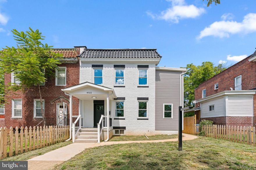 Welcome to this stunning, fully remodeled semi-detached rowhome offering over 2,200+ square feet of thoughtfully designed living space across three spacious levels—all for under $325,000. From top to bottom, this home has been transformed with modern finishes while preserving its classic charm, creating a perfect blend of comfort, style, and value.
As you enter, you're greeted by an open-concept main level featuring expansive living and dining areas filled with natural light, complemented by an eye-catching navy blue accent wall with luxury vinyl flooring and a seamless flow that's perfect for both entertaining and everyday living. The brand new kitchen is the heart of the home, complete with quartz countertops, soft-close cabinetry, stainless steel appliances, and a large island that invites gathering.
Upstairs, the private living quarters include a spacious primary suite with a beautifully updated ensuite primary bathroom w/ the option to add a soaker tub inside (left in bedroom for size reference), along with two additional bedrooms and a stylish full bath. 
The fully finished basement offers incredible flexibility with a large open area perfect for a family room, home office, or guest suite, plus a full bathroom and laundry area.
Enjoy outdoor living with a private gated backyard ideal for relaxing or hosting, along with the convenience of off-street parking. With brand-new systems throughout and high-end finishes at every turn, this home is truly move-in ready.
This is a rare opportunity to own a fully renovated, spacious home at an unbeatable price. Schedule your showing today and experience everything this incredible property has to offer.
