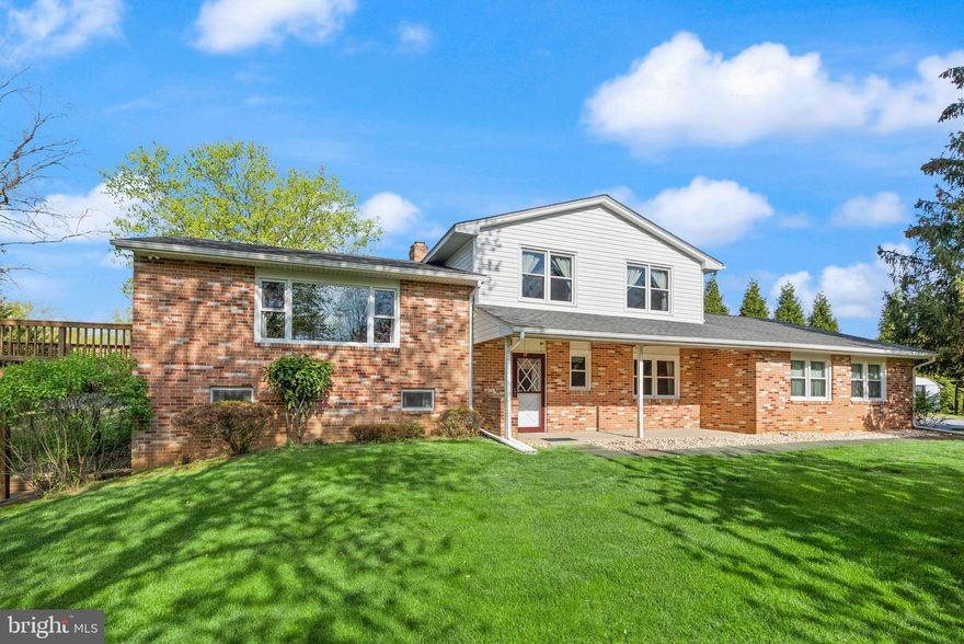 ** All offers are due no later than 8pm on Tuesday, April 21st. <br>
- Be sure to watch the aerial and walkthrough video in this listing. <br> <br>

Perched high on a quiet hilltop in Jefferson, this inviting split-level retreat offers sweeping countryside views, total privacy, and three peaceful acres surrounded by mature flowering trees and pines. A large covered porch anchors the home, perfectly positioned to face east so you can sip coffee while the sun rises. With NO HOA and nearly 2,900 finished square feet, it’s a home that feels both open and wonderfully cozy. <br> <br>
Inside, this custom-built home offers a warm, comfortable flow with spaces that feel both intentional and inviting. The main level features tile flooring, a primary living room anchored by a cozy wood stove and hearth, and a main-level bedroom with soft carpeting and a full ensuite bath, along with a convenient half bath, and a fully separate laundry room with direct garage access… ideal for guests or an easy one-level in-law suite.  <br> <br>

Just a few steps up, natural oak hardwood floors define the upper living areas, where the kitchen, separate dining room, and a spacious second living room come together beneath a large panoramic window that beautifully frames the surrounding views. From here, step out onto the expansive deck (16x16 with wrap-around walkway and take it all in… the kind of place where you lose track of time without trying.  <br> <br>

The top level offers three comfortable bedrooms, thoughtfully arranged to create peaceful, private sleeping areas, complemented by a full bath that serves the floor. Each bedroom feels calm and tucked away, offering a true sense of retreat at the end of the day.  <br> <br>

Outside, the home is completely low-maintenance and thoughtfully equipped with a two-car attached side-loading garage, a carport, industrial insulation in the attic and garage, a whole-house generator transfer switch, a storage shed, a garage refrigerator, and a standalone upright freezer convey with the home.  <br> <br>

Peaceful, practical, and incredibly full of cozy charm… this home is one you’ll want to experience in person. <br>