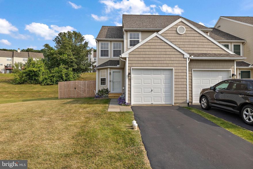 This end unit in Spring Brook Village has a new roof (2022), new deck (2021), new hot water heater (2020), new HVAC system (2023), new privacy fence (2023) which provides the perfect yard space for gardening,  pets, or entertaining in actual yard space in addition to the deck! That's rare to find in a townhouse community and makes it feel like a single family home.  The inside is also equipped with white kitchen cabinets, granite counters, hard flooring, high end Hunter Douglass blinds and every closet hosts custom California Closets! Enter the home through the front door or the attached garage and immediately notice the spacious living room and hard flooring which leads into the kitchen and breakfast area. Upstairs, the primary bedroom has a huge walk in closet with custom cabinetry. The primary bathroom has shower/tub combo and separate sink. There are two additional bedrooms upstairs (both with custom closets) and a second full bathroom.  Head down to the basement, currently great for storage space, or you could add your finishing touches. The new privacy fence and spacious yard create a private oasis perfect for outdoor activities and gatherings, enhancing the feeling of living in a single-family home within a vibrant community. 101 Danielle Lane offers the perfect blend of comfort, convenience, and community spirit. Schedule a tour today to experience firsthand what sets this exceptional property apart!