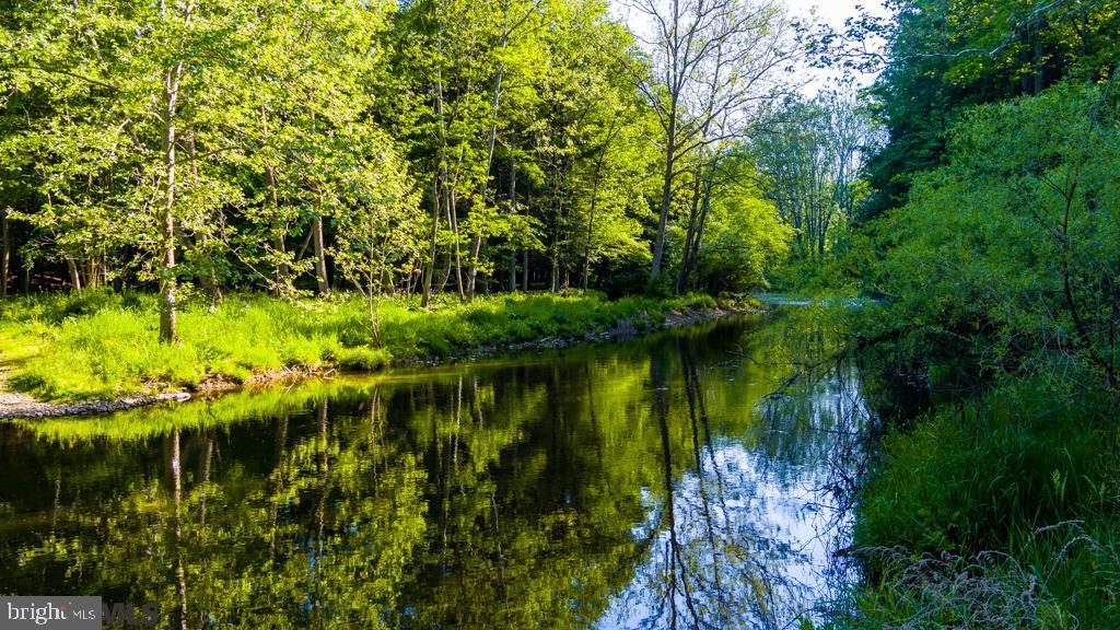 Build your paradise - a home for hunting, your private get-away, or dream recreational property starts here. Cross Bald Eagle Creek and enter your 248 private acres. Enjoy the sights & sounds of the Pennsylvania Wilds and the beauty of the airplane gliders from the neighboring glider-port. This private escape includes plenty of tree cover, food plots, and over 1/2 mile of Bald Eagle Creek frontage; all ideal for lovers of the great outdoors! This property was timbered about 20 years ago. It is extremely nice laying, with only 300 feet of elevation from front to back. Easy access via Old Route 220 to I-80, I-99, it is just 4 1/2 miles as the crow flies to State College, and is very conveniently located relative to Bellefonte, Port Matilda, Penn State, and more! The property includes right-of-way access, Clean & Green tax status, good fishing, and bountiful hunting.