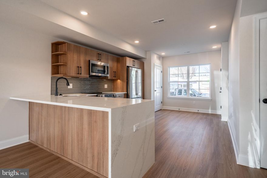 *HOMEBUYER LOAN PROGRAM OFFERING 100% FINANCING, $5,000 LENDER CREDIT AND NO PMI.* 
Welcome to your dream home nestled in the private community of Wynnefield Heights Square. This chic residence boasts 2 spacious bedrooms and 2 modern bathrooms, all enveloped in the comfort of an energy-efficient HVAC system. Step inside to find a meticulously crafted kitchen featuring Quartz countertops with a waterfall edge, Stainless steel appliances, and under-cabinet lighting - bringing warmth and functionality to your cooking space. Natural light floods the space, highlighting the thoughtful details like wood baseboard molding, glass railing, and high end vinyl flooring. The cozy patio off the dining room will serve as serene spot for your morning coffee or evening glass of wine. The chic exterior combines brick and standing seam metal on the mansard roof, enhancing the building's charm and curb appeal. Fully approved 10-year tax abatement promises affordability. Assigned outdoor parking is available for $30,000, ensuring your vehicle's security just steps from your door. Available Summer  2026. Your oasis in Wynnefield Heights Square awaits. 

PHOTOS ARE OF AN IDENTICAL UNIT IN THE DEVELOPMENT.