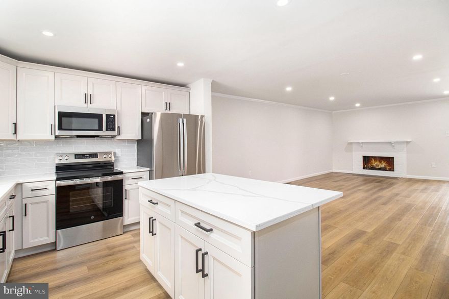 COMING SOON. FULLY RENNOVATED. Welcome to this fully renovated end-unit townhome, offering modern comfort and style in every detail. This beautiful home features an open floor concept that seamlessly connects the living, dining, and kitchen areas—perfect for entertaining or relaxing. The updated kitchen boasts stunning quartz countertops, stainless steel appliances, and custom cabinetry, creating a sleek and functional space for cooking and gathering. Enjoy year-round comfort with central air conditioning and plenty of natural light throughout. The home includes spacious bedrooms, updated bathrooms, and a finished basement that provides additional living space ideal for a family room, office, or gym. As an end unit, this property offers added privacy and outdoor space, making it the perfect blend of luxury and convenience. Available December 1st for $2,795 per month. Don’t miss the opportunity to make this beautifully renovated home yours—schedule a showing today!