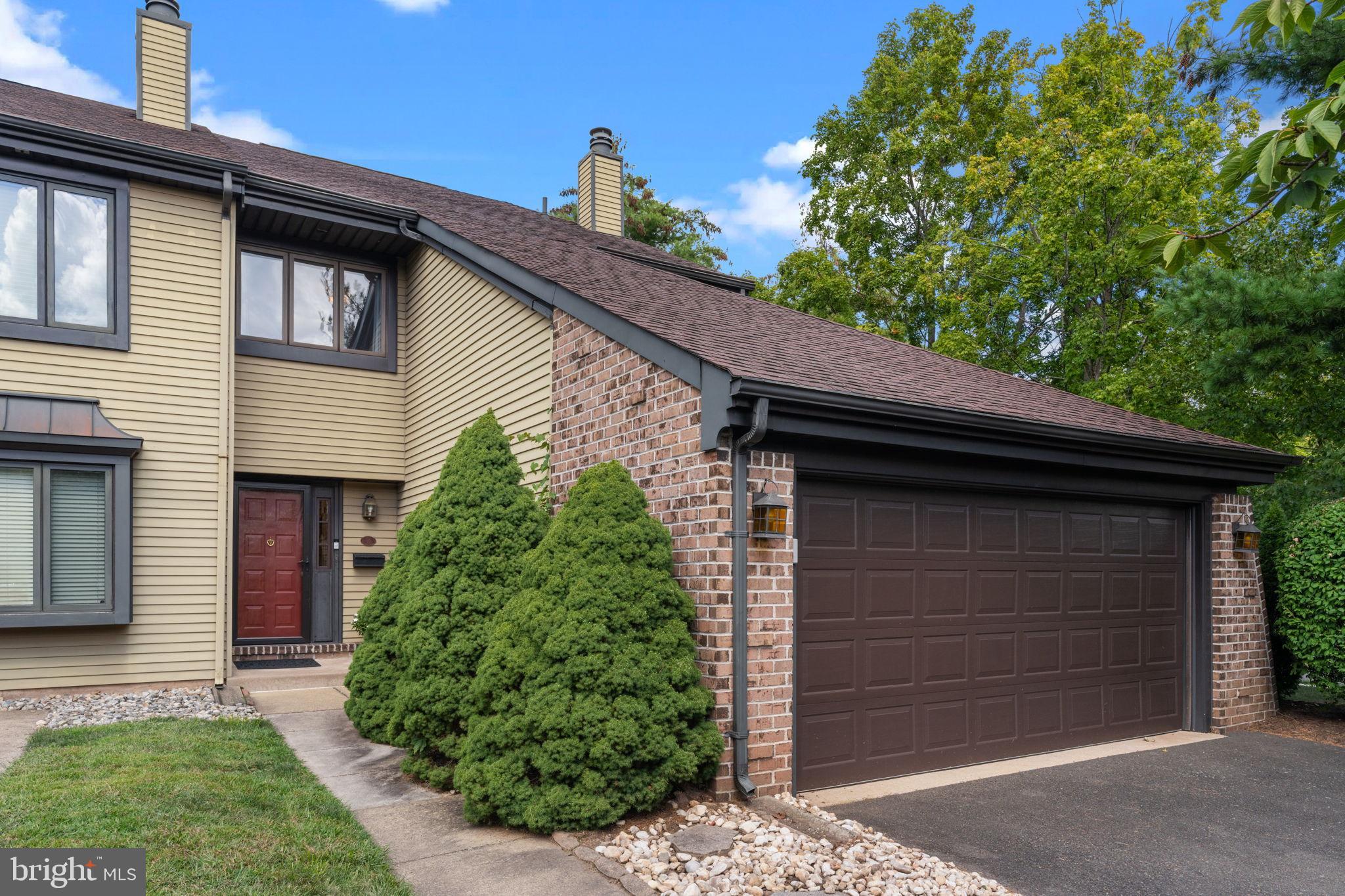 Welcome to this beautifully maintained end-of-row townhouse with a two car garage nestled in the sought-after community of Headley Trace. Offering the perfect blend of comfort, style, and convenience, this home is ideal for those seeking a relaxed lifestyle with easy, walkable access to everything Newtown Brough has to offer.
Step inside and be greeted by an elegant curved staircase and a cozy sunken living room featuring warm hardwood flooring—perfect for quiet evenings or entertaining guests. The formal dining area, positioned between the living room and kitchen, is accented by an arched doorway that adds architectural charm and seamless flow.
The spacious kitchen is a true highlight, boasting stainless steel appliances, sleek Corian countertops, recessed lighting, a large, custom built-in pantry and a convenient breakfast bar for two. A generous dining nook easily accommodates a full-size table, while sliding glass doors lead to a patio overlooking a fully fenced backyard, perfect for morning coffee or weekend gatherings. A stylish powder room with a closet completes the main level.
Upstairs, you’ll find three generously sized bedrooms and two full baths. The oversized hall bath upstairs features a step-up garden tub and connects directly to a laundry room with built-in cabinetry for added storage. The luxurious primary suite includes double closets and a spa-inspired custom walk-in shower.
Love the outdoors? This community is for you! Enjoy fantastic amenities including a swimming pool, tennis courts, and basketball court, all just steps from your front door. Plus, you're a short stroll away from the vibrant heart of Newtown Borough, where charming boutiques and all the amazing top-rated restaurants await.
Don't miss the opportunity to make this exceptional home your own!