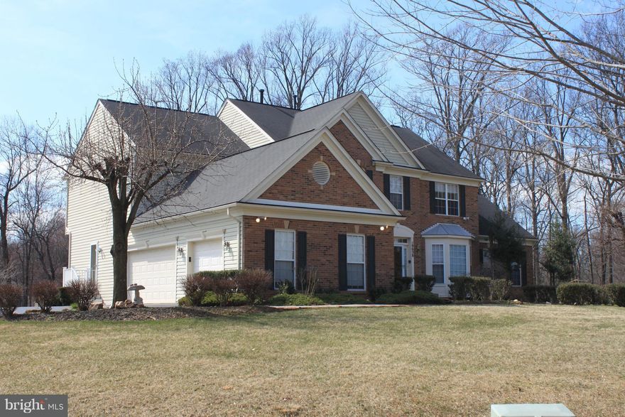 Original Model Home, 5 BR, 4.5 Baths, 3 car side load garage on 2.89 acres. Grand Two Story Entry w/ gorgeous hardwoods. Gourmet Kitchen w/ double oven & SS appliances, 1st Floor Study, Sunroom, 2 Master Suites, Fully Finished Lower level w/ wet bar, billiards room, Rec room, playroom, full bath, & Exercise/6th bedroom. New deck w/ magnificent view of back yard w/ privacy & playground equipment!