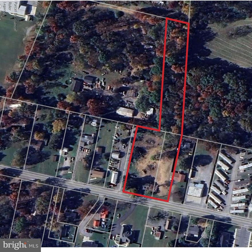 3 Lots totaling 2.52 Ac fronting Rock Cliff Dr.  Sub-division and development possible with Berkeley County Planning approval.  Not zoned.  House is a teardown.  No septic records available.   Public water and sewer available, subject to capacity availability and verification from Berkeley County Public Service. Do not enter house.
