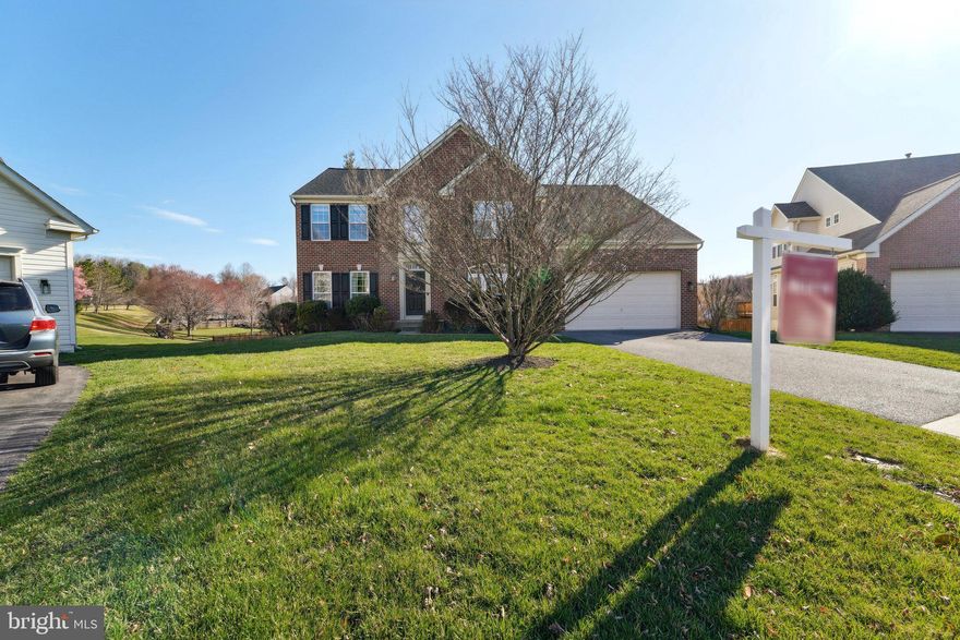 **BACK ON MARKET**  Home Sale Contingency contract did not workout.  Come see this great 4 bedroom, 3.5 bath brick colonial in the highly sought after neighborhood of Jenna Estates!  The cul-de-sac location and the wonderful curb appeal will attract you to this home before you even go inside. There is over 5,300+ finished square feet of living space with features that include:  Grand 2-story foyer as soon as you enter, 9 foot ceilings on top two levels,  private office to your right with double french doors, living room and formal dining room to you left, which take you around to the kitchen complete with a large island, 42" cabinetry, ceramic tiled flooring, brand new microwave (2025), brand new cooktop (2025), 2- wall ovens, recessed lighting and recessed lighting.  The kitchen is also connected to the bright Morning room that is surrounded by windows and has a high vaulted ceiling.  There is also a door straight out to the composite deck where you can sit and enjoy looking out at the very private backyard that backs to trees.  The deck also has steps down to the backyard as well.  Back inside the large family room is adjoined to the kitchen and has a stone gas fireplace for cozy nights at home.  The main level also has a mudroom/laundry room that leads out to the 2-car garage!  Upstairs is where you will find the 4 bedrooms and 2 full bathrooms.  The primary suite has vaulted ceilings, ceiling fan, walk-in closet, an  additional closet and a wonderful en-suite bathroom with a large corner soaking tub, 2 separate vanities, separate shower and water closet.  The lower level is fully finished and very spacious with brand new carpeting (2025), the 3rd full bathoom and potential 5th bedroom with a huge walk-in closet.  The lower level walks straight out to the backyard too.  Roof was replaced in 2020, AC 2020, HWH 2018, Washer/Dryer 2023!  All of this and the location can not be beat!  You can feel like you're living in the country but can get to shopping & restaurants within minutes.  Don't miss this MOVE-IN READY home!