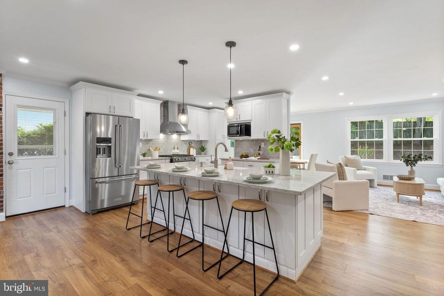 Welcome to 5528 Marlin Street — a beautifully updated four-level split nestled on a quiet, tree-lined street in Rockville’s highly sought-after Manor Lake community. This meticulously maintained and renovated home offers modern upgrades throughout.

The main level showcases a fully renovated and expanded kitchen (2022), designed for both everyday living and entertaining, featuring a gas range, stainless steel appliances, Corian countertops, and a spacious eat-in area. The sun-filled living room and formal dining room provide an inviting setting, with sliding glass doors that open to the backyard patio—perfect for indoor-outdoor living.

Upstairs, you’ll find four generously sized bedrooms and two full baths, including a serene primary suite complete with a walk-in closet, an additional closet, and a beautifully renovated en-suite bath (2017) featuring a double vanity and walk-in shower.

The first lower level offers an expansive family room with a cozy wood-burning fireplace and custom built-ins, creating the perfect gathering space. This level also includes a renovated powder room (2024) and a large laundry room with flexible space ideal for a home office, gym, or hobby area, along with walk-out access to the private backyard.

The fourth level adds even more versatility, featuring a newly finished space (2026) with updated flooring and lighting, plus ample storage.

Significant recent improvements provide peace of mind, including a new roof (2021), siding (2021), gutters and downspouts (2021), energy-efficient windows (2015–2021), HVAC system (2019), and a new concrete driveway (2025).

Outside, enjoy beautifully manicured landscaping in both the front and backyard. The private backyard is ideal for morning coffee, outdoor dining, or relaxing evenings.

Ideally located just minutes from scenic trails, Lake Frank, and Rock Creek Park, and within walking distance to Rock Creek Village Shopping Center featuring Safeway, CVS, and local dining. Commuters will appreciate easy access to the Metro Red Line and downtown Rockville. Optional membership to Flower Valley Bath & Racquet Club is also available.

This is a rare opportunity to own a turnkey home in one of Rockville’s most beloved neighborhoods—don’t miss it!