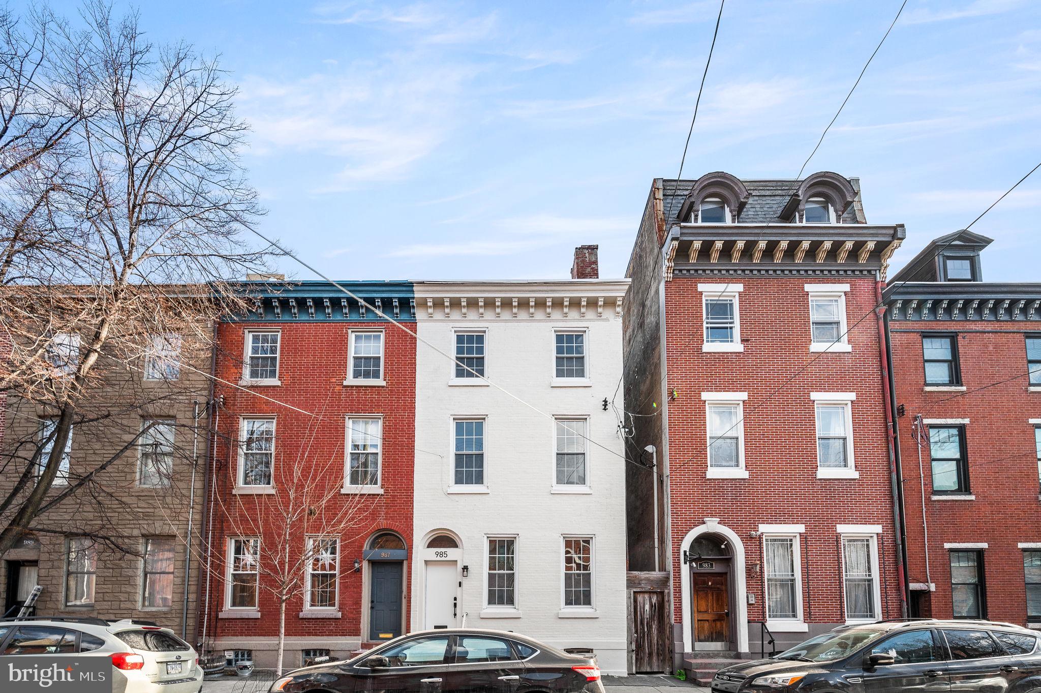Welcome to this beautifully renovated, spacious 3-story row home in the highly sought-after Northern Liberties neighborhood of Philadelphia. With a 21 ft wide lot, this home offers generous living space with high ceilings, modern finishes, and an unbeatable location.
As you step inside, you’ll immediately notice the open and airy feel of the main floor. The front bedroom can easily be transformed into a formal dining room, offering versatility for any lifestyle. A convenient powder room is also located on this level, along with a comfortable living room perfect for relaxing or entertaining. The stylish kitchen features sleek stainless steel appliances and a colorful backsplash that adds a pop of personality, ideal for preparing meals or hosting guests.
Upstairs, the second floor includes two generously sized bedrooms, a full bathroom, and a laundry room for ultimate convenience. The third floor is dedicated entirely to the owner’s suite, featuring a spacious bedroom and bathroom for a private retreat.
Outside, you’ll find a large yard, offering endless possibilities for outdoor activities, gardening, or simply enjoying the fresh air.
Additional features include an unfinished basement, which is perfect for extra storage or can be transformed into your dream space.
Located in Northern Liberties, this home offers easy access to trendy restaurants, cafes, shops, and parks, while being just moments away from downtown Philadelphia.