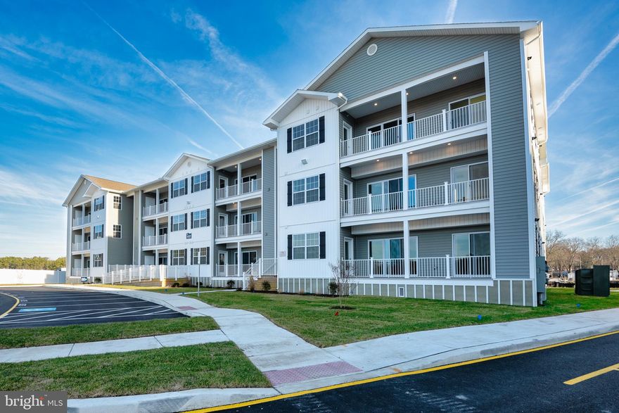 First Floor Admiral unit. Come explore the newest condominium project in Lewes, Delaware. Located off of John J. Williams Highway just 5.5 miles to Rehoboth beach and 9.6 miles to Cape Henlopen State Park.  Building A (final building) is complete and ready for occupancy. Project has a total of six buildings with 30 units. Community features pool and pool house and a gated entrance for security. All units one level ranging from 1086 square feet to 1397 square feet. Units feature nine foot ceilings, Granite countertops in kitchen and baths, stainless steel appliances, ceramic tile shower walls and natural gas. All units have large private balcony. Each building has a common elevator.   Sales center open Saturday 11-2.