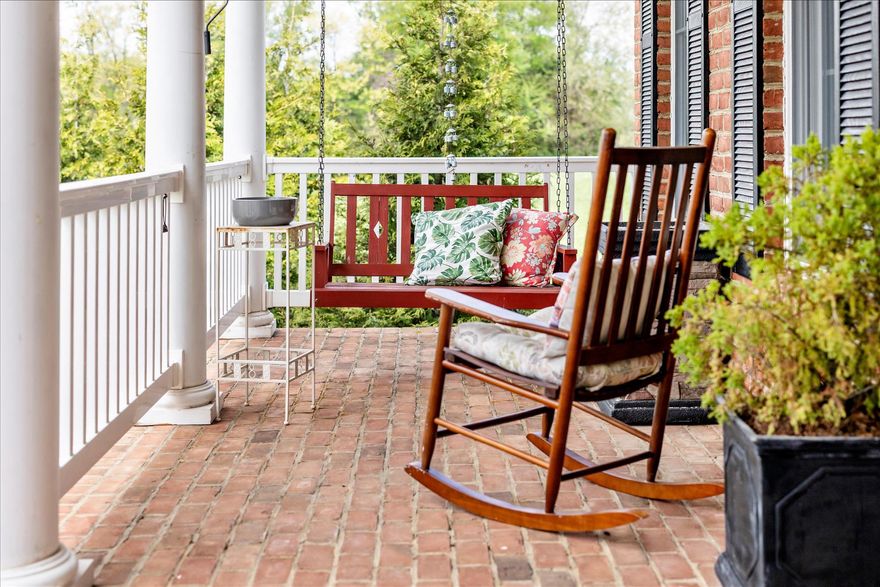 NEW ROOF TO BE SOON INSTALLED
With over 5,700 square feet, this stately brick-fronted Executive-style 6-bedroom, 4.5 bath Colonial sits on a small knoll and features 360 degree views. Inside, the expansive interiors lend themselves to gracious living. Outside, you will fall in love with the bucolic, pastoral views while enjoying your beautifully landscaped piece of paradise.  Set back off the road, this petite pocket neighborhood (NO HOA) of elegant homes on large lots is surrounded by hundreds of acres of farmland. Perfect for a family that entertains or a multi-generational family, this home features, inside and out, multiple spaces to gather, multiple places for privacy, with plenty of flexible space that can be adapted to suit any set of needs at any given time. 

The interior of the home tastefully combines classical design elements with contemporary touches and blends the best of traditional dedicated rooms with open-space concept areas. 9’ ceilings, crown molding and hardwood floors throughout, plus upgraded contemporary lighting with traditional ceiling medallions. 

Foyer opens on one side to a library/study/home office, and on the other side to a formal dining room; a gracious contemporary living room with traditional touches, such as the colonial detailing on the fireplace mantel and French doors opening to more outdoor living spaces. 

Open concept Kitchen/Breakfast Room/Sunroom captures abundant east and south natural light. Nicely sized island, granite counters, stainless steel appliances, plus cherry cabinets with BOTH undermount and overmount lighting!  Main level mudroom to the 2-car garage – yes, with the indoor charging station. 

Massive main-level primary suite gets morning light from oversized windows and opens to a deck. Ensuite has jetted soaking tub, separate shower, separate sink vanities and a makeup vanity – and of course an ample-sized walk-in closet. 

Upstairs is a junior suite (bedroom with walk-in closet and a private bathroom), two bedrooms (with walk-ins) joined by Jack-and-Jill bath, and then a large, finished room with smaller interior room that is open to interpretation. Bedroom? Family Room? Home office? Home schooling? Convert to a second master suite? 

Meanwhile, 1,400 sf of lower level was upgraded and updated in 2019. The comfortable lounge/gathering room centers on sleek, contemporary, eco-friendly flush mount electric fireplace, with plenty of room for pool table and more. The high-design expansive bar could have been plucked out of an on-trend boutique hotel! All the right things are present:  wine fridge, second drink fridge, sink, dishwasher and a combination microwave/convection oven. A nook is ready for a kegerator or full-size fridge.  Plus, a full-size bedroom and an upscale European spa-style full bath. French doors open to yet another at-grade outdoor entertaining area. Entire lower level could easily be set-up for au pair or in-laws 

Extensive landscaping and gardens (flower gardens, lavender herb gardens, vegetable gardens – great for homesteaders, and passionate cooks) and flowering ornamental trees – and a garden shed of course!

Additional outdoor living spaces include:
• Spacious brick front porch promises magical sunsets.   
• Lunch under the wisteria draped pergola
• Cocktails while grilling
• Built-in fire pit for star gazing. 
• Another gathering area, which could be a spot for a hot tub or more. 

Home is updated with smart recessed lighting throughout, able to be remote controlled for brightness and type of light (daylight, reading, etc.). Smart thermostats. Fiber optic has been laid and has been promised to be available soon! Meanwhile, sellers have used Starlink and rave about its service and reliability. Reasonable commute times to Frederick, Baltimore, Fort Meade, Fort Detrick, the 270-Biotech Corridor, Columbia, Ellicott City and Westminster.