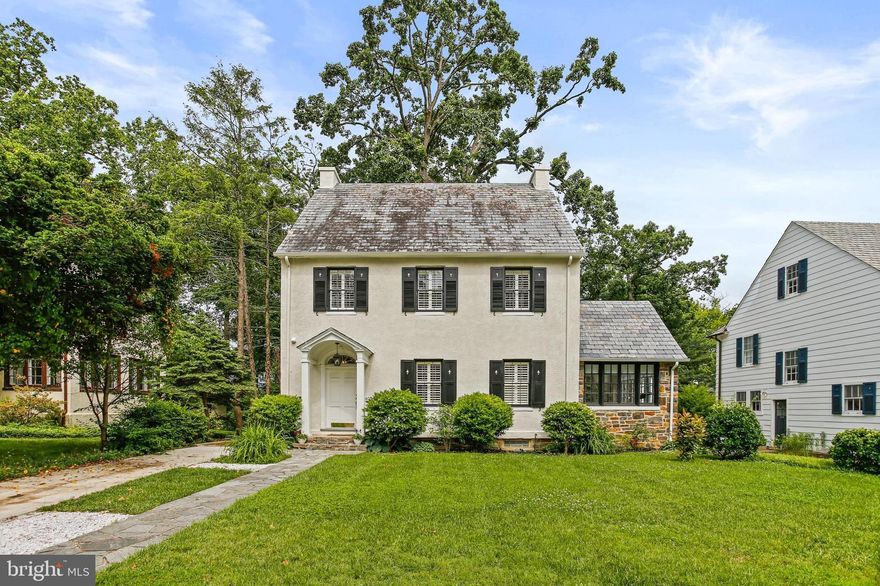 This magnificent residence is ideally located in the heart of Guilford, just one block from the renowned Sherwood Gardens. Offering the perfect blend of historic charm and modern sophistication, this home features 5 bedrooms, 4.5 bathrooms, and over 3,900 square feet of beautifully updated living space across four finished levels.

A welcoming covered front porch sets the tone, leading into a bright and airy interior adorned with original hardwood floors and abundant natural light throughout the main level. The spacious living room, complete with a wood-burning fireplace, flows into a formal dining room—ideal for hosting gatherings. An adjacent sunroom, with windows on three sides, provides a tranquil space to relax and unwind. There is also a convenient half bath on this level.

The chef’s kitchen features an eight-burner professional-grade gas range with vented hood, brand new 48" white cabinetry, quartz countertops, a stylish tile backsplash, and an oversized center island offering ample prep and seating space, perfect for entertaining.  

Upstairs, the second floor includes a stunning primary suite with a large walk-in closet and a luxurious ensuite bathroom with a double vanity and an oversized walk-in shower. Two additional generously sized bedrooms, a beautifully renovated hall bath with double vanity and tub/shower combo, and a convenient laundry area complete this level.

The third floor hosts a second primary suite with soaring cathedral ceiling, exposed beams, multiple closets to include a large walk-in closet, and an ensuite bathroom with penny tile flooring and a frameless step-in shower with bench seat.

The fully finished lower level provides exceptional flexibility, with a spacious rec room, fourth full bath featuring a jacuzzi tub, a fifth bedroom or bonus room with walk-up access to the backyard, and a unique private cellar with exposed stone walls and wood trim—ideal for a wine room, gaming space, or home office.

Step outside from the kitchen to a charming covered rear deck that leads to a spacious patio and a beautifully shaded backyard with mature trees—ideal for outdoor entertaining, summer cookouts, or simply relaxing in nature. Additional highlights include an oversized driveway and a detached one-car garage, providing ample off-street parking.
 
This extraordinary home combines timeless architecture with thoughtful updates in one of Baltimore’s most desirable neighborhoods. Don’t miss the opportunity to make it yours!