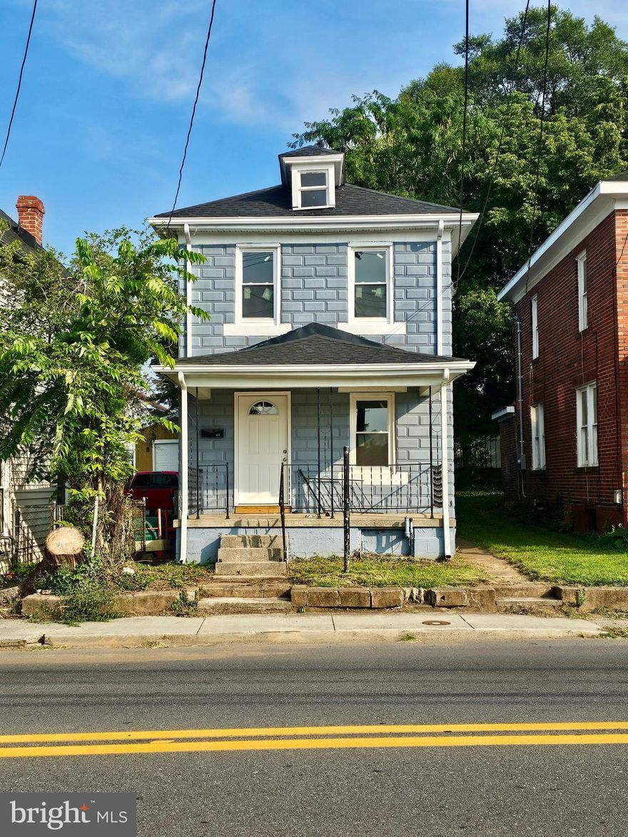 Situated a short walk to downtown Martinsburg, this home is freshly updated both inside and out, and ready to be yours. Brand new flooring on both levels, upgraded electric work,  plumbing, AND roof! The kitchen boasts stainless steel appliances and has room for a table, Upstairs are 3 bedrooms and 1 full bathroom. The backyard is the perfect size to be easily maintained. Close to schools, shopping, restaurants, and more. Schedule your showing today!