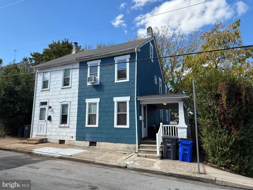 Totally renovated home near park and schools! Approaching this corner property you will immediately notice the updated exterior. The large private side porch is where you will greet loved ones and spend time relaxing. Entering the home you'll see all new luxury vinyl plank flooring and upgraded fixtures. The living room offers ample light and a ceiling fan. Passing through the formal dining room you will see lovely stained glass transom accents. Cooking in the kitchen will be a delight thanks to stainless appliances, newer cabinetry with soft close doors and a large pantry. There is also a rear access to the back yard and patio from the kitchen. Heading upstairs to the second floor, we find two bedrooms and a hall bath. The rear bedroom offers a private second full bath. A private third bedroom is located on the third floor. Out back the rear yard is completely fenced and there is a private side patio to enjoy. The sellers of this home have completely updated this home including new windows, new drywall, new plumbing, new electrical, new flooring, new kitchen, new bathrooms, new fixtures and more! The cherry on top of this fantastic property is the SUPER LOW property taxes!!! Is there any downside here? Take a look at this beautiful home before it's gone!