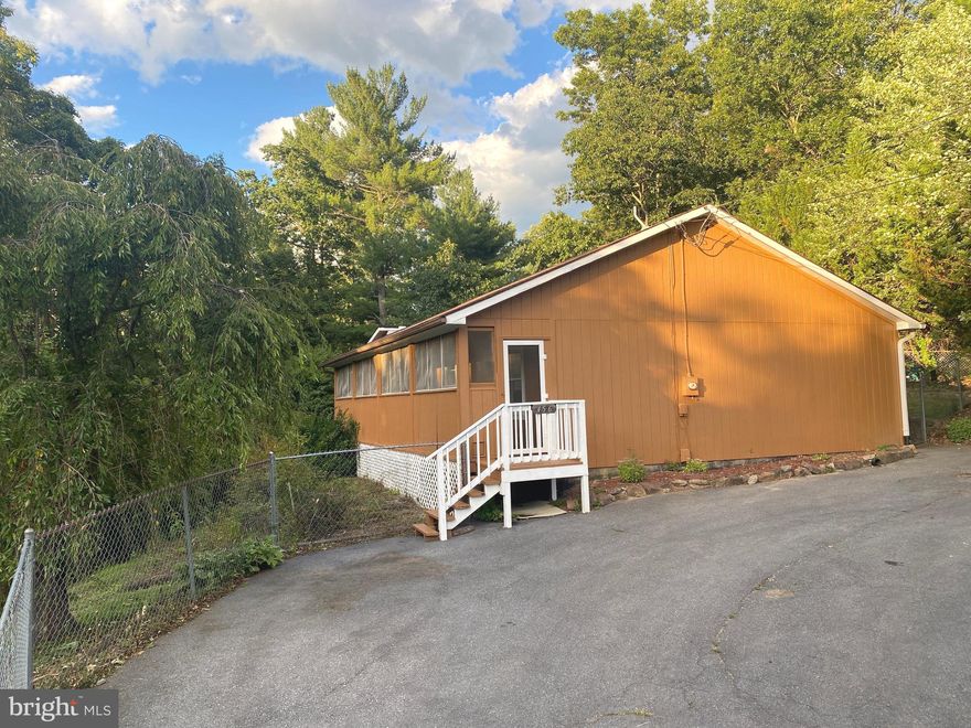 This remodeled rancher offers 4 bedrooms and 3 full bathrooms. This home is move-in ready featuring a large master bedroom with vaulted ceilings and master bathroom. Centrally located, the spacious kitchen with new LVP flooring opens to the living room and features a walk-in pantry and laundry closet. Down the hall you will find the other 3 bedrooms, one of which also has its own full bathroom. New carpet and fresh paint throughout this home! The front porch is screened in and has plenty of room to add seating. Out back you will find a covered patio with plenty of room in which to put your barbecue grill and create an inviting outdoor atmosphere so you can relax and enjoy the nature that surrounds you. There is a shed for storage and a paved driveway for parking. The yard has a chain link fence so bring your pets!