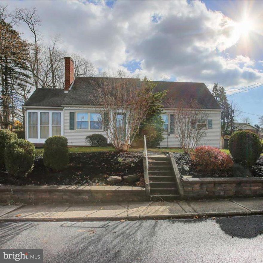 Welcome to 704 E Orange St, a delightful Cape Cod-style home perfectly nestled in Shippensburg Borough. This 3-bedroom, 1.5-bath home offers timeless charm with modern conveniences, making it an ideal place to call home. Step inside to discover original hardwood floors that exude warmth and character throughout the main living spaces. The cozy wood-burning fireplace in the living room sets the perfect ambiance for chilly evenings. A newly renovated full bathroom on the first floor provides modern comfort and style, while the enclosed side porch invites you to relax and unwind year-round. This home is equipped with natural gas heating for energy efficiency, and a one-car detached garage adds convenience. A one-year home warranty is included, offering peace of mind to the future owner. Located just minutes from Interstate 81 and local shopping centers, 704 E Orange St combines small-town charm with easy access to all your needs. Don’t miss the opportunity to own this gem in a prime location. Schedule your private showing today and make this Cape Cod your new home!