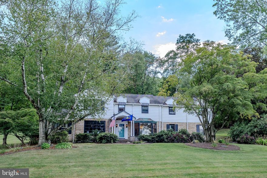 Welcome to one of Pottsville’s most distinguished residences—an elegant 1957 estate originally
built and owned by the renowned Jack Rich family, whose legacy is woven into the fabric of the
town’s history. Nestled on a generous 0.78+-acre lot, this stately home offers over 5000 sq ft of
finished living space (plus a finished basement), blending mid-century charm with modern
luxury. From its grand entryway to its sun-drenched solarium, every detail has been thoughtfully
updated with ornate finishes while preserving the home’s timeless character.
The property boasts 5 bedrooms, 3 full baths, and 2 half baths. It also features a lot of Size of 0.78 acres with expansive front, side, and rear yards.  You will find it very interesting that the luxurious new bathroom features updated spa-like luxury with a freestanding soaking tub, dual vanities, oversized walk-in shower with waterfall head and body sprayers, shiplap accent walls, and original marble flooring. The oversized Bedroom features large windows with natural lighting, new flooring, custom closets, a ceiling fan, ornate doors, and new lighting fixtures.