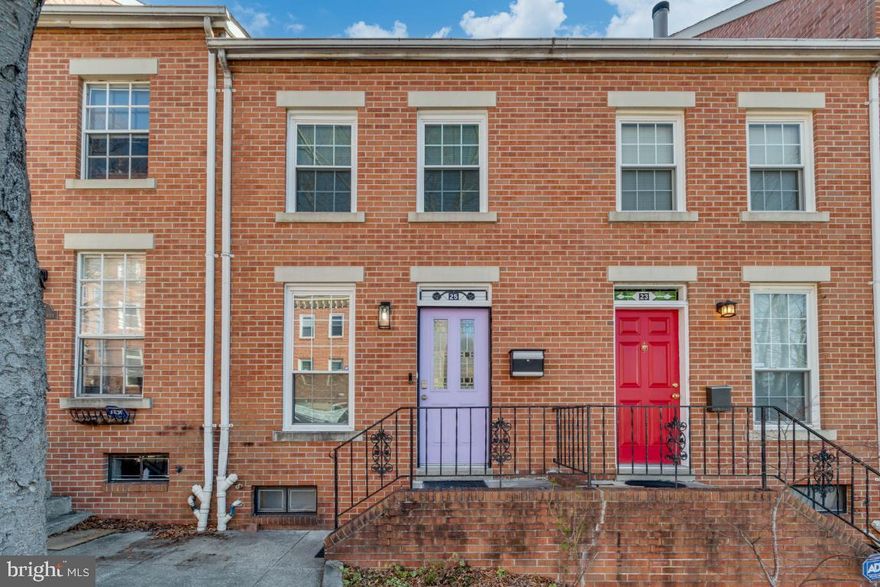 *Offer deadline Sunday, March 2nd at 5pm* Welcome to your new charming home at 25 North Ann Street in vibrant Baltimore! This cozy 2-bedroom, 2.5-bathroom row house spans 1,036 square feet and is packed with character and modern amenities. Step inside to find beautiful exposed brick, hardwood floors, and a welcoming fireplace that adds warmth and style. The expansive eat-in kitchen boasts sleek granite counters, stainless steel appliances, and plenty of cabinet space, perfect for any home chef. Enjoy the convenience of a finished basement, complete with a large extra room downstairs and a handy laundry room with plenty of storage. Since purchasing there have been several updates, including new recessed lighting, several beautiful custom closets and hardwood flooring on the 2nd floor and in the basement. Outside, a large, tiered deck and fenced-in backyard create a perfect outdoor retreat. Don't miss out!