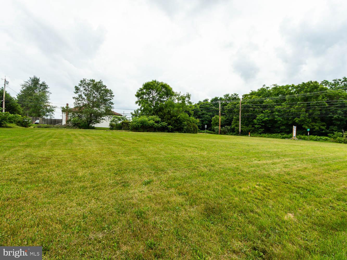 Prime Location, Prime Development Opportunity! Unlock the potential of this .58 acre property fronting West College Avenue, strategically located just one mile from Penn State’s campus. Zoned for the West College Neighborhood District (previously Terraced Streetscape District), this site is ideal for a private office, business, or mixed-use investment with apartments, offering income-generating potential. The district’s zoning is specifically designed to foster a pedestrian-friendly environment with small-scale retail and entertainment, boosting evening and weekend activity. The possibilities are vast and include hospitality, retail sales, service or rentals, business or professional offices, breweries, cideries, or craft distilleries, pharmacy, health club, medical/dental/veterinary clinic, and community and bank or financial services.