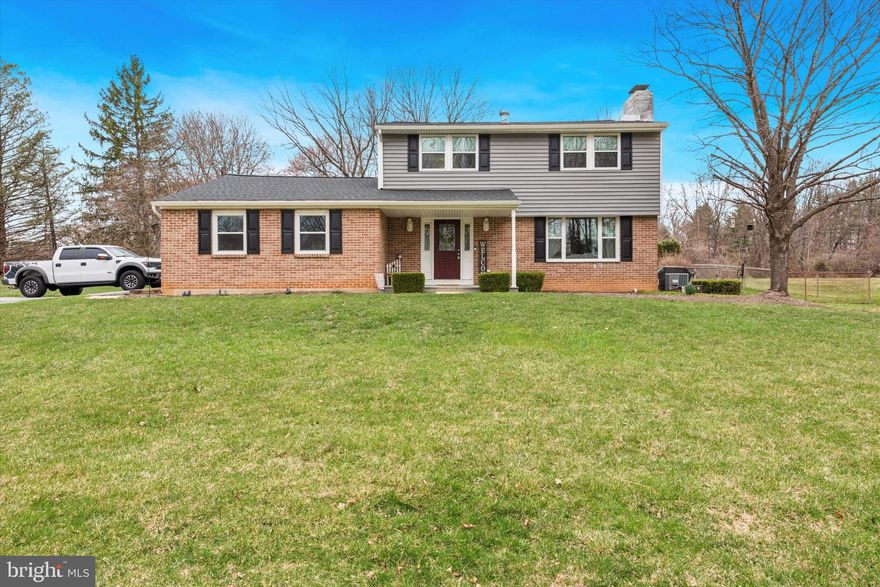 Welcome home to 1344 A Morstein Road in beautiful West Chester, PA. 
Located on a private and serene 1 acre lot and down a long, tree-lined driveway, your beautiful life awaits you here - and just in time for a gorgeous summer by the pool.

Park in the driveway and walk down the pathway to your formal front door. Beautiful original hardwood floors greet you, along with a spacious sitting room on your right that's drenched in natural light and equipped with a wood-burning fireplace. The living room feeds into your open-concept kitchen and dining area with large doors opening to your outdoor oasis, a bay window overlooking the pool area, and more windows in the kitchen area. Continue around the first floor to find a formal dining room space and directly into an extra large den that functions as a living/recreation space and has endless possibilities. A powder room completes the first floor as you circle back towards the front of the home.

Upstairs you'll find 4 bedrooms of varying sizes and a full bathroom with a tub-shower and double vanity. Ample closet space in the bedrooms, ceiling fans, and large windows outfitted with window treatments
Clean & organized, the spacious basement is perfect for storage and/or hobbies you may have, while the outdoor detached garage offers even more room for activities.

In 2022 the Owners replaced the roof, siding, and windows, updated the electrical - entire house, panels, fuses, circuit breakers - and added the pool shed. In 2023/2024 they added the basement sump pump, basement sink, and installed the above-ground hot tub on the side patio of the house.

Enjoy all of the shopping & eateries of Downtown West Chester, the commutability of route 202, and the highly-rated West Chester School District right here on Morstein Road.