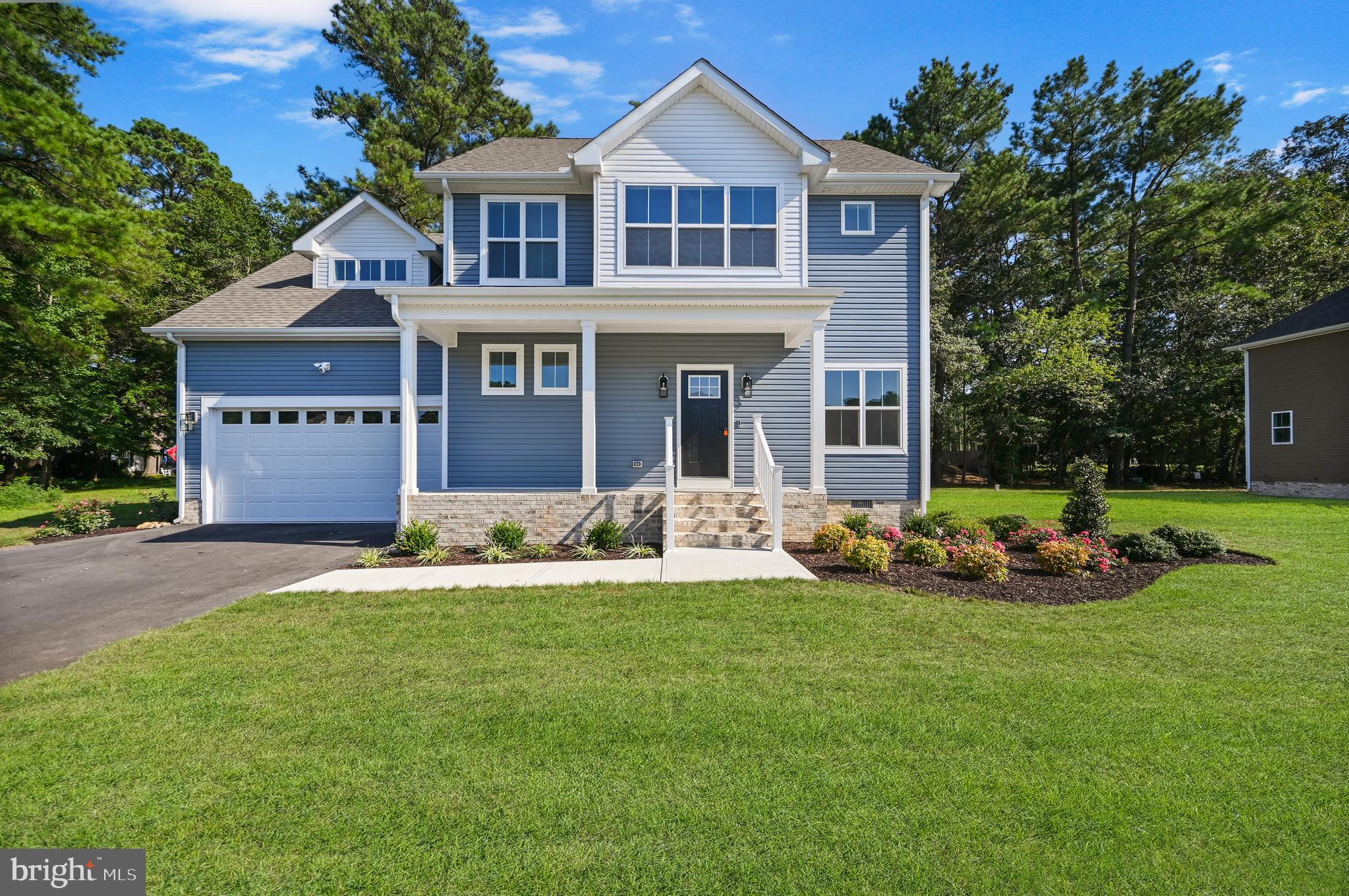 Step into this stunning 4-bedroom, 2.5-bathroom new construction home located in the desirable Fruitland community. Designed with an open-concept layout, this home offers the perfect blend of space, style, and functionality for today's lifestyle. At the heart of the home, the kitchen is sure to impress with its expansive island, elegant quartz countertops, premium Fabuwood cabinetry with soft-close drawers, stainless steel appliances, and a tile backsplash—ideal for cooking, entertaining, or simply gathering with loved ones. The main floor includes a well-placed half bath and a convenient utility room for added practicality. Upstairs, retreat to the owner’s suite, complete with a bathroom that boasts dual vanities, a custom tiled walk-in shower, and a large walk-in closet. Three additional bedrooms share a stylish full bathroom featuring a tile tub/shower combination—perfect for family or guests. Enjoy outdoor living on the low-maintenance TimberTech deck, ideal for weekend barbecues or evening relaxation. A front-facing two-car garage provides secure parking and extra storage space. Combining modern design, thoughtful features, and top-tier materials, this home is move-in ready and built to impress. Schedule your private showing today and see what makes this home truly exceptional!