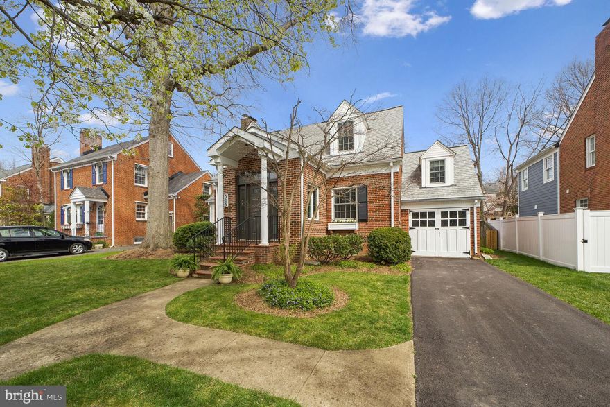 Welcome Home! This Beautiful, 4 bedroom 3.5 bath, brick Cape Cod is nestled in one of Arlington’s most sought after neighborhoods of Ashton Heights! Originally built in 1938, this charming, impeccably maintained home was fully renovated and added on to twice, once in 1995 and again in 2007. The inviting foyer has high ceilings, a built-in bench, and an ample coat closet. The formal living room is furnished with custom, built-in cabinets and a gas fireplace and features a den, ideal for an office, music room, or playroom. The spacious formal dining room has a bonus room connected, perfect for an oversized pantry. Walk back into a sun-drenched, chef’s kitchen which boasts top-of-the-line appliances, beautiful skylights, and granite countertops. The breakfast nook with matching granite, custom table overlooks the beautifully manicured, large backyard and attaches to the covered back deck. The main level bedroom can double as a second living room and is complete with an en-suite full bath. Upstairs features a sunny, primary suite with a private bath, large walk-in closet with custom shelves and custom built-in dresser. The washer and dryer are conveniently located right outside the primary suite. Right down the hall are two spacious bedrooms with generous closet space and another full bath. The basement is divided between a fully finished living area and an enormous storage space with extra workshop area. The original laundry room/half bath in the basement is easily finished into a full bath. The professionally landscaped, gorgeous backyard is fully fenced with a back deck perfect for entertaining.  The home offers unparalleled convenience, situated just a brief stroll away from the Virginia Square Metro, an array of exquisite dining options, and the vibrant atmosphere of Ballston Quarter, all within a 10-minute walk. Don’t miss this property!