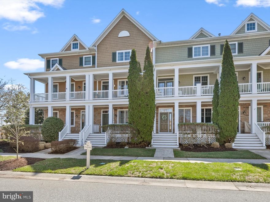 This stunning three-story Bayside retreat offers the perfect blend of comfort, elegance, and coastal charm. Enjoy breathtaking views of the serene pond and fountain from the inviting front porch and multiple balconies, creating the perfect setting for relaxation. This well-maintained interior townhome is just a short walk to the community center, Signatures restaurant, Freeman Arts Pavilion, and all the incredible amenities this desirable coastal community has to offer. Completely move-in ready, this unit is being sold fully furnished and beautifully decorated. With a rental income history upwards of $30,000 per summer, it's an ideal choice for a full-time residence, secondary home, or vacation rental.

The first floor features a private bedroom and full bath, ideal for guests or a quiet retreat, along with convenient access to the spacious two-car garage.

Head upstairs to the main living area, where an open-concept kitchen and dining space await. The kitchen boasts light wood cabinetry, ample storage, and white appliances, making it a bright and cheerful space for preparing meals. The adjoining dining area seamlessly flows into the living room, where a cozy fireplace adds warmth and charm. Step out onto the front balcony to take in the tranquil pond views. A convenient powder room completes this level.

On the top floor, you'll find an additional bedroom with an en-suite bath, as well as a laundry room for added convenience. The luxurious primary suite is a true sanctuary, featuring two oversized walk-in closets and an expansive en-suite bath with a tiled shower stall and built-in seat, a soaking tub, dual vanity, and a private water closet. A set of sliding doors leads to a private balcony, perfect for enjoying morning coffee or evening breezes.

The two-car garage offers plenty of space for beach gear, bikes, or even a game room, while ample driveway and nearby lot parking ensure convenience for guests. Whether you're seeking the perfect beach getaway or a lucrative rental investment, this Bayside beauty delivers.

As a resident of Bayside, you'll have access to a wealth of resort-style amenities, enhancing your coastal living experience. Don't miss this opportunity to own your slice of paradise!