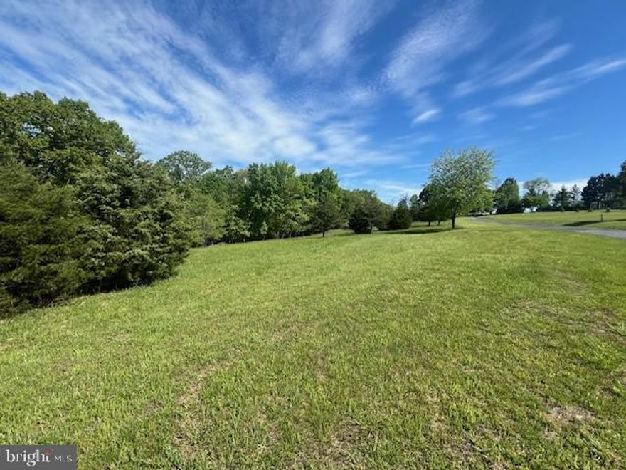 Whether you are looking for a great building site, an established community with very low yearly road fee(2025-$100), or just a pretty setting ..lot #3 has it all! 
Top Meadow boasts underground utilities and paved roads. Approx 5 miles to downtown Berkeley Springs where you will find shopping, dining, summer concerts in the park and lots of events year round!
Cacapon State Park is only 10 mins away and offers great golfing, lake for fishing, nice beach area, new mountain bike trails, hiking and a brand new lodge!!!
Land inventory is limited so, this one will not last long!
