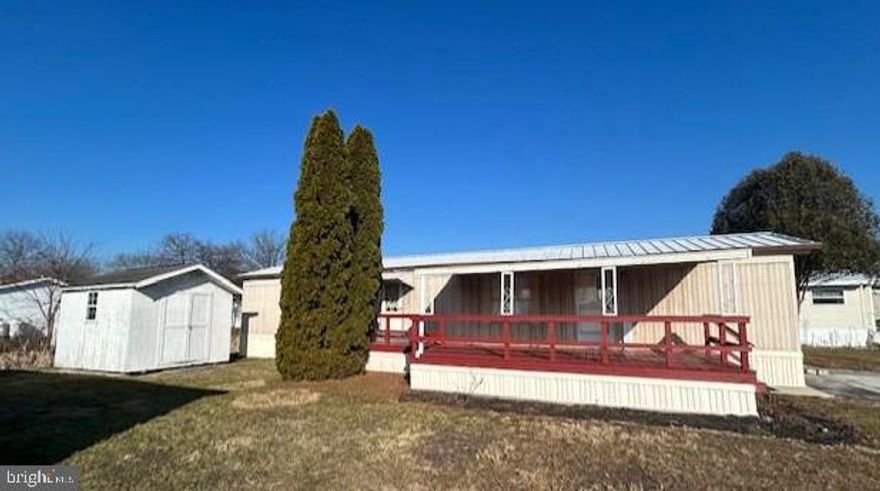 Previous buyer was not approved by park. Now is your chance! This adorable 2-bedroom, 1-bath, single wide mobile home in Lincoln Estates is move-in ready and full of charm. Home is a 1988 Derose Industries, Inc/ Amherst Model 66x14. Featuring fresh paint in some areas and laminated flooring for a clean, modern look. This unit is all electric for ease of cooking, clothes dryer and heating/CAC. Appliances include a range, countertop microwave, and washer/dryer for added convenience. Spacious covered porch 20x14on the front is great for sitting out and grilling on those summer nights or protecting your front door during winter weather. Large storage shed for all your yard/garden tools, mower and extras. Paved parking spot for two vehicles. Located just minutes from Historic Gettysburg, Local Orchards, Wineries, many great restaurants and a short drive to Liberty Mountain Ski Resort, this home offers both rich in history and recreational attractions nearby. Lot rent is billed monthly at $628, which includes $565 for rent, $48 for sewer, and $15 for trash; the current seller pays an additional $5 pet fee, bringing the total to $633 per month. One pet is allowed. Whether you're looking for a great starter home or planning to downsize, this cozy and affordable property is a fantastic opportunity in a welcoming community. PLEASE NOTE: For buyers using mobile financing that does not fund the day of closing, possession will not be transferred until funds are received by Seller. Buyers must have park approval. Seller related to listing agent. #welcomehome #gettysburgaddress #lincolnestates