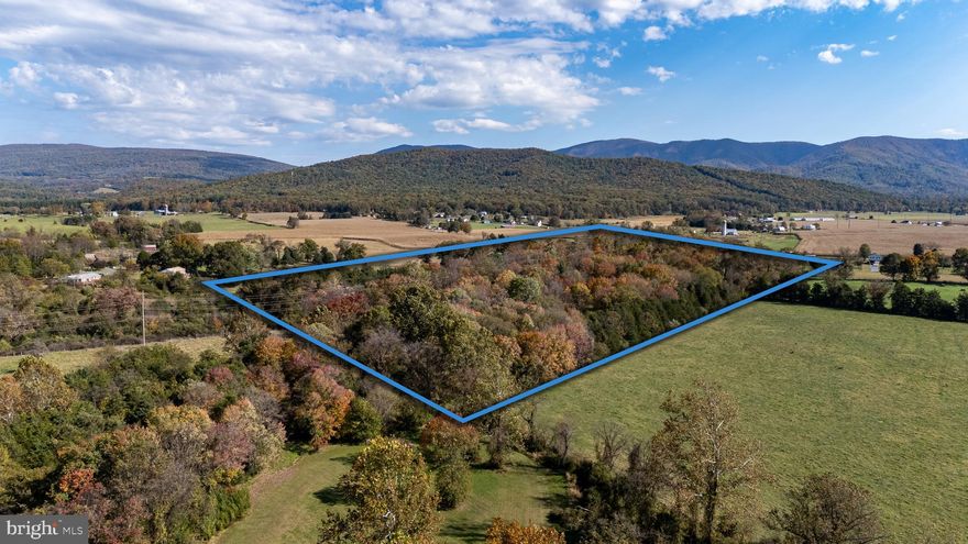 This 10.37-acre residential-zoned property offers a rare blend of privacy and convenience just 5 minutes from downtown Luray. Flat and partially cleared, the land features winding trails that weave through peaceful, natural surroundings. Surrounded by open farmland, the setting is quiet, serene, and perfect for building your dream home or retreat. With beautiful views and easy access to town amenities, this property offers the best of both worlds—rural charm and modern convenience! Recently surveyed and boundaries marked in October 2025, with updated ROW included. NO DRIVE-BYS. Appointment only.