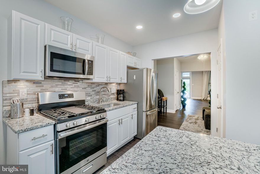 Great home in Beverly Hills,  Baltimore City! Fantastic home  is convenient  to downtown, Johns Hopkins and major interstates. Newly renovated w/ all new appliances in the kitchen,  granite counters and seating  area. Renovated bathroom and newly installed half bath on the main level. Woods floors though-out the main level. Carpeted stairs and upper level with 3 large bedrooms. A great place to call home!