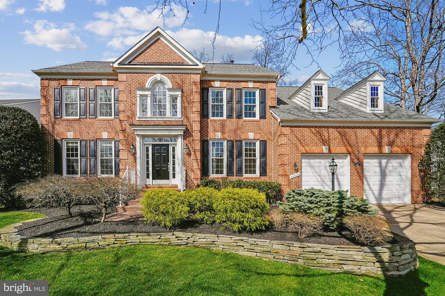 Welcome to your dream home in the heart of South Riding! This stunning property filled with natural light offers over 5,000 square feet of meticulously designed and well-maintained living space, perfectly situated on an expansive lot designed for both relaxation and entertainment.
The bright and airy main level features hardwood flooring (refinished 2026) and  a flowing layout with formal living and dining rooms, plus a dedicated home office—perfect for today’s remote work lifestyle. The heart of the home is the expansive family room with wood-burning fireplace (plumbed for gas should you wish to change) , which transitions seamlessly into a gourmet kitchen boasting updated appliances, a charming breakfast area, and direct access to your outdoor oasis. An oversized two car garage with ample space for vehicles, a work bench or extra storage along with a dedicated laundry room complete this level.
Move upstairs to the massive primary suite, a true sanctuary featuring a private sitting room, a generous walk-in closet, and a newly remodeled spa-like bath with a deep soaking tub and a large walk-in shower.
The second and third bedrooms share a convenient Jack-and-Jill bath and offer peaceful views of the backyard. The fourth bedroom serves as an ideal guest suite with its own private full bath.
The finished walk-out lower level provides endless possibilities. It includes a massive rec room ready for your personal touch, a large bonus room (perfect for a gym or media center), and an additional full bath.
Step outside to a fully fenced, private backyard. Whether you’re hosting a summer BBQ on the large deck or winding down on the expansive patio, this outdoor space is built for memories.
Recent updates and improvements include new carpet  (2026), new roof and gutters (2022), dormers (2025), kitchen appliances (2023/24), new water heater (2026), and windows and patio doors on the main and upper levels (2020).
The South Riding community amenities include four community pools, 6+ miles of bike/pedestrian trails, a dog park, tennis, pickleball and basketball courts along with much, much more! Convenient to Dulles International Airport, shopping, dining and major commuting routes.