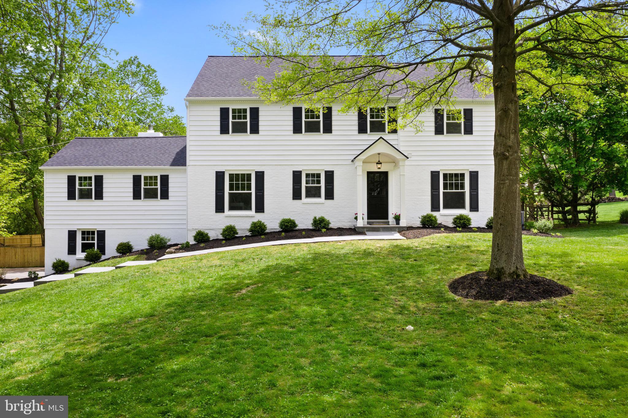Please contact the listing agent for a private virtual showing with the owner. Don t miss out on the opportunity to see this completely renovated 5 bedroom, 3.5 bath, 3 story Colonial with finished basement and 2 car garage, situated on a one acre fenced lot on one of the Main Line's most coveted streets. Total sq footage 3,925. If you are looking for something newly renovated and fresh, with low taxes, look no more! This home has curb appeal that will thrill, and a floor plan that is open and gracious, with amazing outdoor space. The moment you approach this home, you will notice the completely new exterior; new roof, siding, windows and gutters, all accented by lush landscaping. The newly built front portico with stylish metal roof will welcome you, and shelter guests from the wet weather. Upon entering the enlarged front hall, you will be wowed by the ultra hip and chic millwork on the walls. To the left are the formal powder room and private home office, great for working from home :). From the foyer to the right is an open living/2nd family room with a wood-burning fireplace which is flanked by gorgeous upscale sconces. This leads you to the spacious screened-in porch and private deck. The living room flows effortlessly into the dining room, which makes it a natural gathering spot, and not only a beautiful room but also a functional living space. Just beyond the dining room you will experience the true wow factor of this home as you enter the custom kitchen and vaulted-ceiling great room. You will be amazed by the stunning, light filled, brand new white kitchen, featuring an 11 foot island with white quartz countertops. The size and finishes in this kitchen are in line with most homes priced much higher than this one. The kitchen has stainless appliances, including a gas range with hood and a Bosch microwave / 2nd oven. The shaker style cabinets have brushed gold hardware and there is beautiful lighting above the island. This kitchen is an entertainer s dream, featuring a wine/bar area with a beverage fridge and designer backsplash tile with gold accents. Just off of the kitchen is the great room with high ceilings and custom built-in banquette seating for 6-8 people, making this space ideal for cozy family dinners, or fun gatherings while watching the game. The great room has a brand new gas fireplace with reclaimed wood mantle, and ample space for the family to gather. All the hardwood floors in the home have been recently refinished with a gorgeous dark walnut stain. Off the kitchen is a super cool shiplap staircase down to the huge tiled mudroom and carpeted finished basement, as well as the 2 nice sized storage spaces and the 2 car garage. The second floor has 4 bedrooms, 3 full brand new baths and a large, sun-filled, laundry room. The master bedroom has a walk-in closet and an en suite bathroom with a generous sized shower, Pottery Barn mirrors with classic lines, polished nickel fixtures and a double sink vanity with a carrera marble countertop. Two of the bedrooms are joined together by a fabulous Jack and Jill bathroom with custom penny tile and another double sink marble vanity. The hall bathroom, just off the fourth bedroom has a bathtub and is also equipped with two sinks. The 3rd floor has brand new carpet and is finished as a 5th bedroom, but it would also be an ideal playroom or 2nd home office. New two zone HVAC system, 2 new hot water heaters, fenced flat back yard, wonderful outdoor deck, screened-in porch, 5 bedrooms, new upstairs laundry room, new roof, new windows, new siding and gutters, all new baths, new designer kitchen with banquette seating, separate dining room, 2 fireplaces, enlarged mudroom, 2 car garage and finished basement. This Main Line Dream House checks all of the boxes! This home is located in the award-winning, top-rated T/E school system, in one of the most desirable areas of the Main Line. Sitting just a few minutes from both downtown Wayne close to Train and Center City