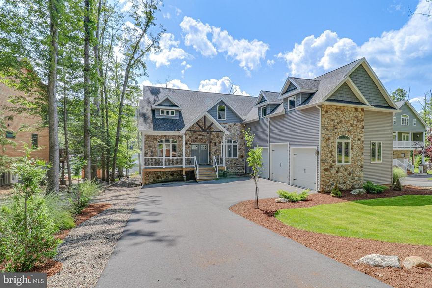 ABSOLUTELY STUNNING LAKE FRONT ,TURN KEY, HOME IN THE PRIVATE, GATED COMMUNITY OF EAGLE ROCK RESORT! Built in 2022, this tastefully designed  lake front home, with a 3 car garage, primary bedroom on the first floor, large kitchen  with a large island, all over looking the lake and mountains  is a rare find in Eagle Rock.  Located on the center of Lake Susquehanna lake, boasts some of the best lake front and mountain views in Eagle Rock. Other high-end features include; dog washing station in garage, tankless hot water heater, barn doors, copper apron sink in kitchen, wood barrel vanity in half bathroom ,granite island and counters in kitchen, large composite deck and so much more! 
Eagle Rock offers many 4 season amenities; 2 golf courses, ski, snow tubing, indoor/outdoor pools, lake, beach, gym, tennis, pickle ball and basketball courts, bocce ball pavilion, spa, equestrian center ,are just to name some of the many amenities you can enjoy !