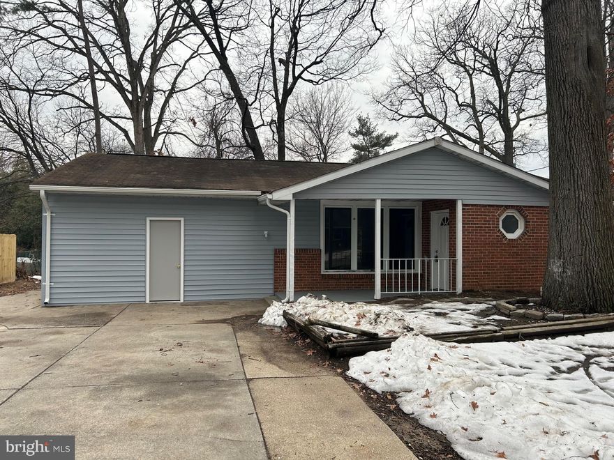 This beautifully renovated 4 bedroom 2 bath home in the heart of Anne Arundel County offers a great lot on a low traffic street with easy access to major highways and shopping.  The brand new large eat in kitchen opens into a large family room with bay windows.  The entire house has just been painted and all the flooring is brand new. Multi car driveway in a quiet well kept neighborhood make this a home a great buy.