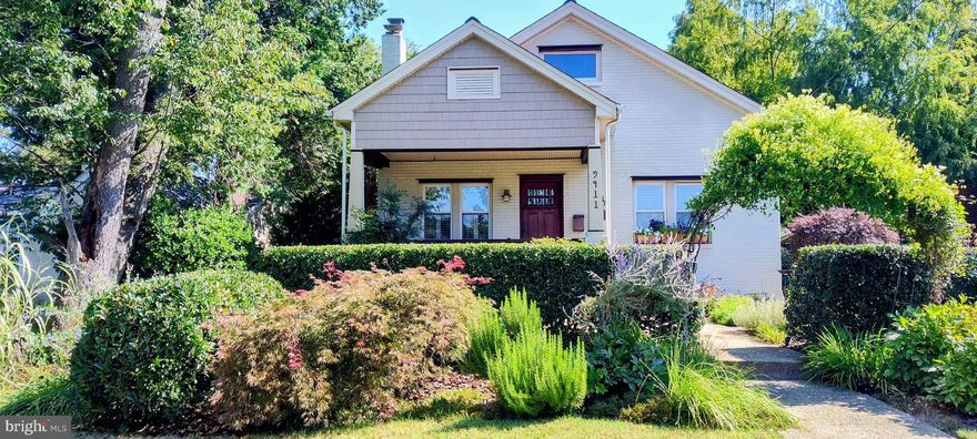 The Dean of Architecture at the U of MD has retired and this is his fabulous home. Don't miss this home! Best house on the street! It just keeps going and going!  Tour this meticulously renovated bungalow in a vibrant neighborhood that truly offers it all.  This architectural dream, a testament to thoughtful design is up for sale with a new price!
This residence has undergone a complete and comprehensive renovation with exquisite details. This expanded home has four bedrooms and three luxurious baths, with real hardwood floors and lots of abundant natural light. And the must-have, a screened porch, offering serene views of a breathtaking, colorful perennial garden. Beauty all year long! A firepit area for Fall awaits! Porches and balconies surround this cleverly designed home creating your private sanctuary.
The covered front porch leads to the intimate living room, with a wood burning fireplace and classic mantel.  Sunlight filters through windows with custom shutters.   A sleek dining area has a contemporary chandelier; this room sets the tone for elegance and fun gatherings. The kitchen, a true chef's dream has a professional-grade Blue Star gas range, a brand known for its handcrafted quality since 1880.  Function and style set the scene.  The kitchen flows effortlessly into the wide-open family room, with a granite breakfast bar, perfect for casual meals that can be enjoyed in front of the gas fireplace. Two fireplaces on the main level! One gas and one wood burning.
The family room marries modern design with classic comfort. featuring a second fireplace cleverly crafted with a bespoke steel panel, custom-fabricated by a local artist. Just press the remote!  Walls of windows and sliding doors blur the lines between indoor and outdoor living. The custom screen porch leads down to a charming stone patio, framed by hand-crafted stone walls, and an enchanting, low-maintenance perennial garden. This thoughtful layout continues on the main level, where two comfortable bedrooms and a full renovated bath offer convenience and privacy. The upper level has two incredible primary suites; each designed with an emphasis on style and tranquility. The main primary bath and bedroom are pulled from the pages of Architectural Digest, with custom windows and an intimate sitting room creating your private haven.  The lux primary bath has Greek natural stone finishes and custom cabinetry. The second primary suite is currently configured as a top-of-the-line home office, complete with its own full bath and a private balcony overlooking the garden.  Check the photos for the bedroom style if needed instead of an office. A huge unfinished basement with an exit offers storage and future development. 
An EZ commute awaits. A Ride-On bus stop is just around the corner, providing a quick and convenient route to downtown Silver Spring Metro, where ample parking garages are available. EZ commute with the Beltway too. Silver Spring has an urban/suburban vibe that appeals with restaurants, theatres and parks so close by. 
This move-in ready architectural marvel awaits its next discerning owner. Explore the interactive tour to appreciate the potential for an extended family and the vibrant community that surrounds this stunning home.