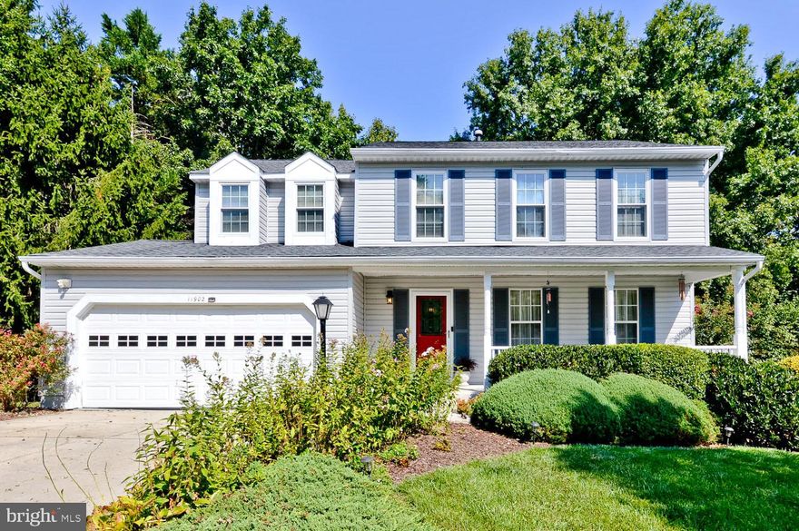 Welcome home to this beautiful 4-bedroom 2.5 bath colonial in sought after community of Severn Crossing.  Whole house freshly painted, lovingly maintained & updated throughout. Main level features include new "hardwood floors", formal living room and dining room, kitchen with granite counters and stainless-steel appliances, large family room which leads to the deck.  Skylights throughout first and second levels! Second level highlights are new carpet throughout, spacious owner's suite with walk in closet, beautifully updated owner's bath, ... and 3 additional bedrooms with updated hall bath.  Lower level finished basement is ready for family fun and entertaining.  It leads to a screened in porch which walks out to a private backyard. Additional Bonus room in the basement now being used as an office.  You will enjoy the privacy of the backyard which backs to trees while sitting on the deck or in the screened in porch!   Fantastic neighborhood with basketball courts, tennis courts, pool, walking trails, park, playground and clubhouse. **This home qualifies for a $10K grant and NO Mortgage Insurance. ** Ask me for details.