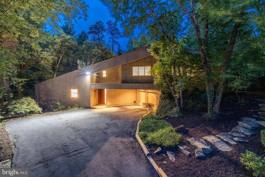 OPEN HOUSE SUNDAY 8/6 This is the one you’ve been waiting for! Come fall in love with a delightful Acorn designed custom contemporary home nestled in the woods, just minutes from the Metro, l-66, Dulles Toll Road, major shopping , dining, and many additional local amenities. This amazing home features three bedrooms and three full baths, an open floor plan, cathedral ceilings in several of the rooms, breakfast bar and wet bar area, and huge master suite with adjoining upgraded bath and his and hers closets. The upstairs loft offers beautiful views of the outdoors and pond and a huge space for a home office, workout space, you name it. A true flexspace! There are so many upgrades! This home has been lovingly cared for and it shows! Some of the newer features include roof, flooring and carpet, newer windows and doors, remodeled baths, new circuit  breaker, fresh paint throughout, quartz countertops, the list goes on…oh and did I mention that there is also a whole house Generac generator and an electric vehicle charger in the garage? After a busy day come home to this little oasis in the woods - and enjoy your front row view of nature! - Check out the birds, lily pond complete with local frogs, trees, deer, flowers and waterfall…all from the wall of windows in your family room! Hurry hurry because this home is a must see!