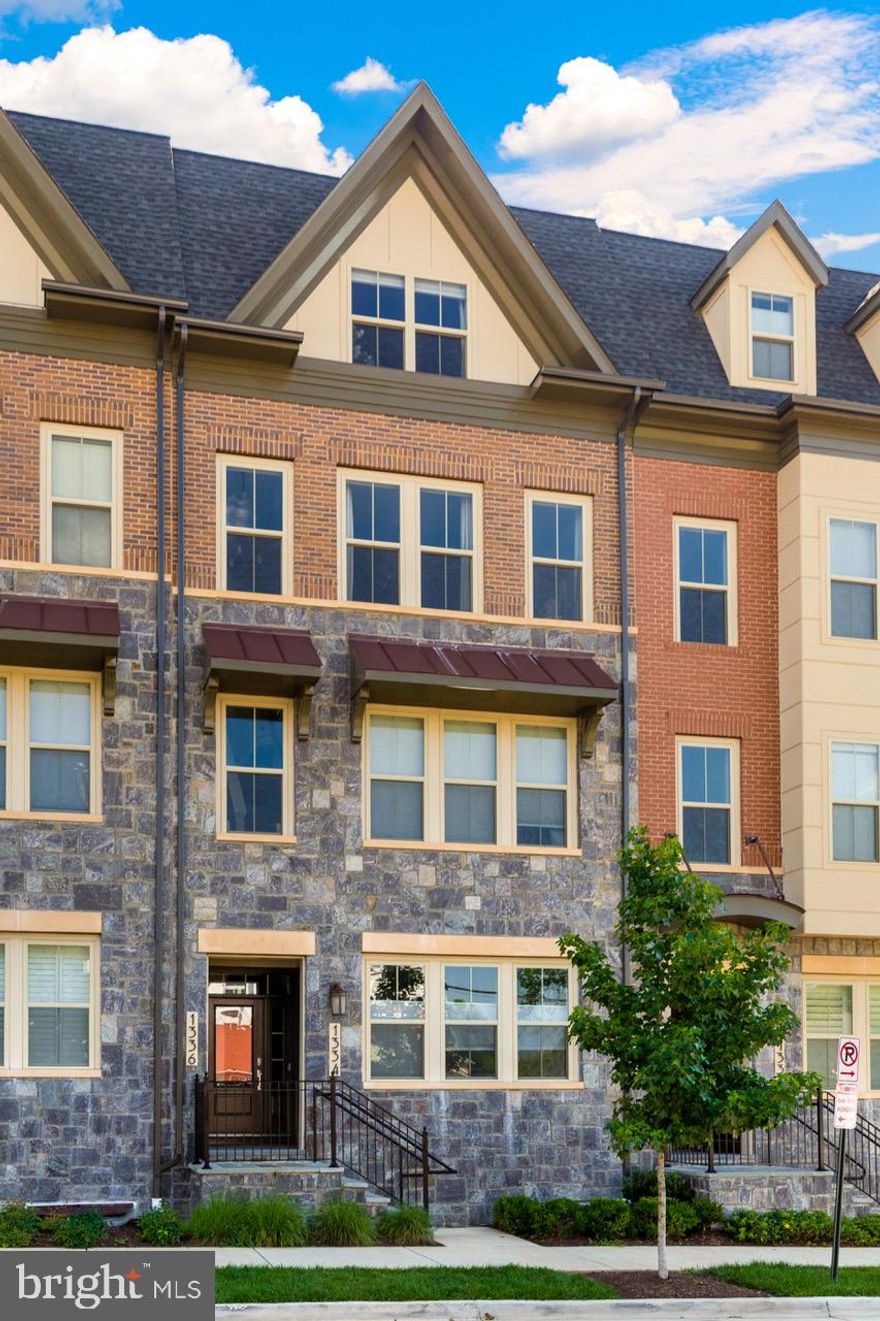 Stunning, like-new townhouse just minutes from Pentagon City, Clarendon and DC! Popular Washington model with a light-filled open layout, beautiful hardwood floors throughout all levels and an expansive rooftop terrace. Gourmet kitchen featuring quartz countertops, a large island and stainless-steel appliances opening to both the living and dining rooms. Primary suite with a luxurious primary bath and dual walk-in closets. Two additional bedrooms, a full bath and bedroom level laundry complete this home. Only a short walk to Pentagon Metro and close to I-395 and Route 27, making DC and Alexandria a short drive.